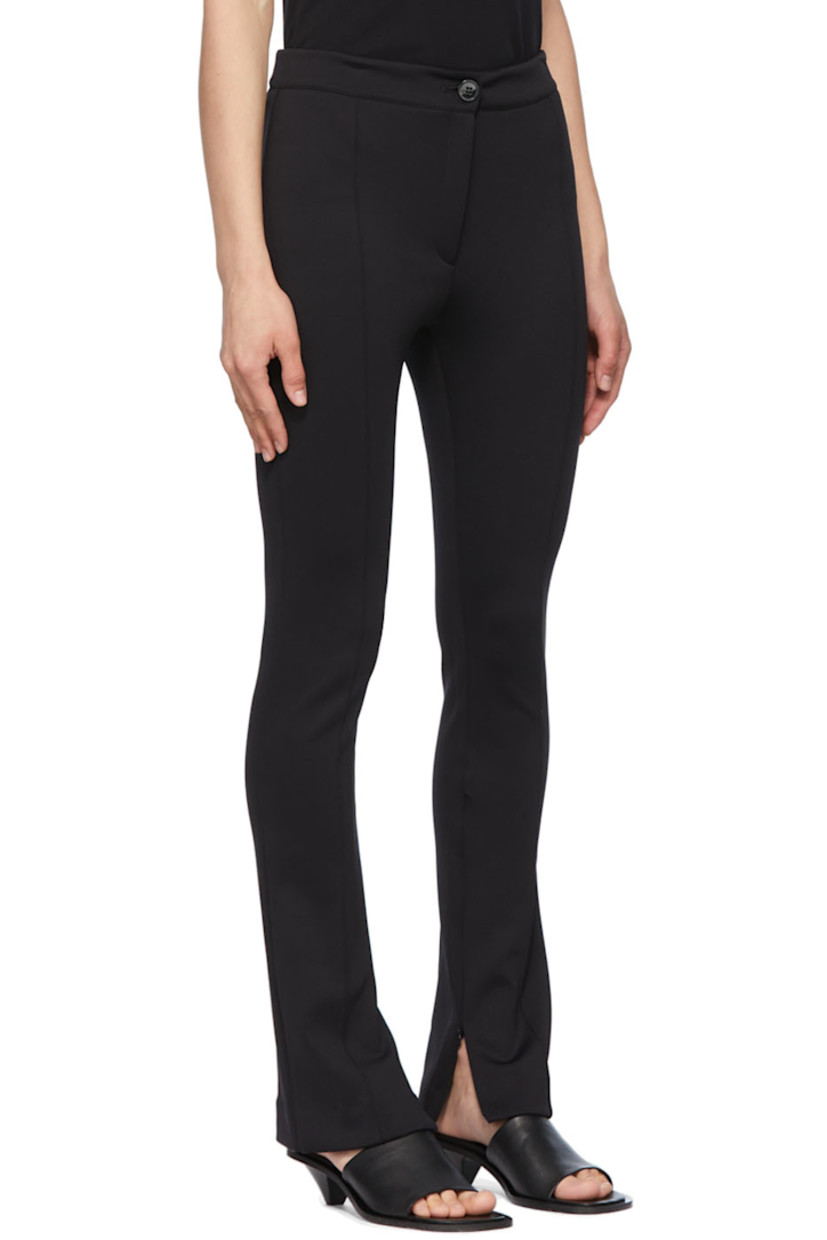 Stretch recycled nylon jersey trousers.

· Zip-fly
· Zippered vent at inseams
· Pinched seams at front and back

Supplier color: Black