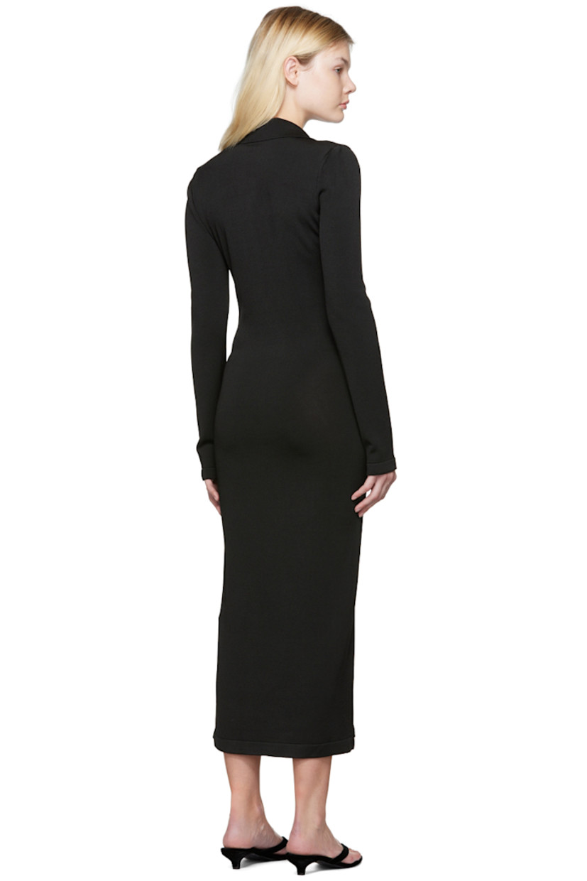 Viscose-blend jersey dress. 

· Spread collar
· V-neck
· Asymmetrical button closure
· Gathering at front 
· Vent at front hem 
· Unlined 

Supplier color: Black