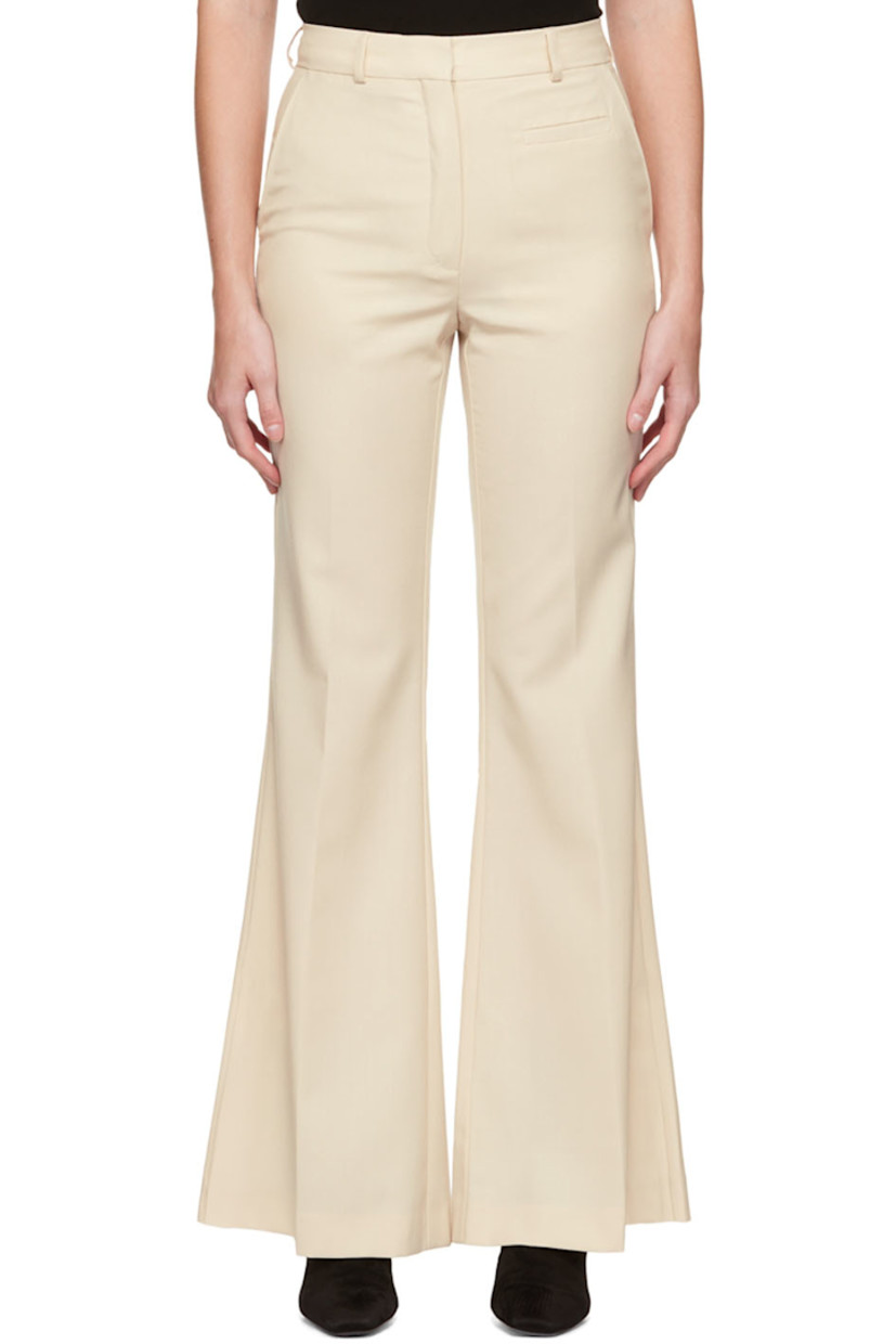 Plain-woven polyester and wool-blend trousers.

· Belt loops
· Four-pocket styling
· Zip-fly
· Central creases at front and back
· Vented cuffs

Supplier color: Vanilla white