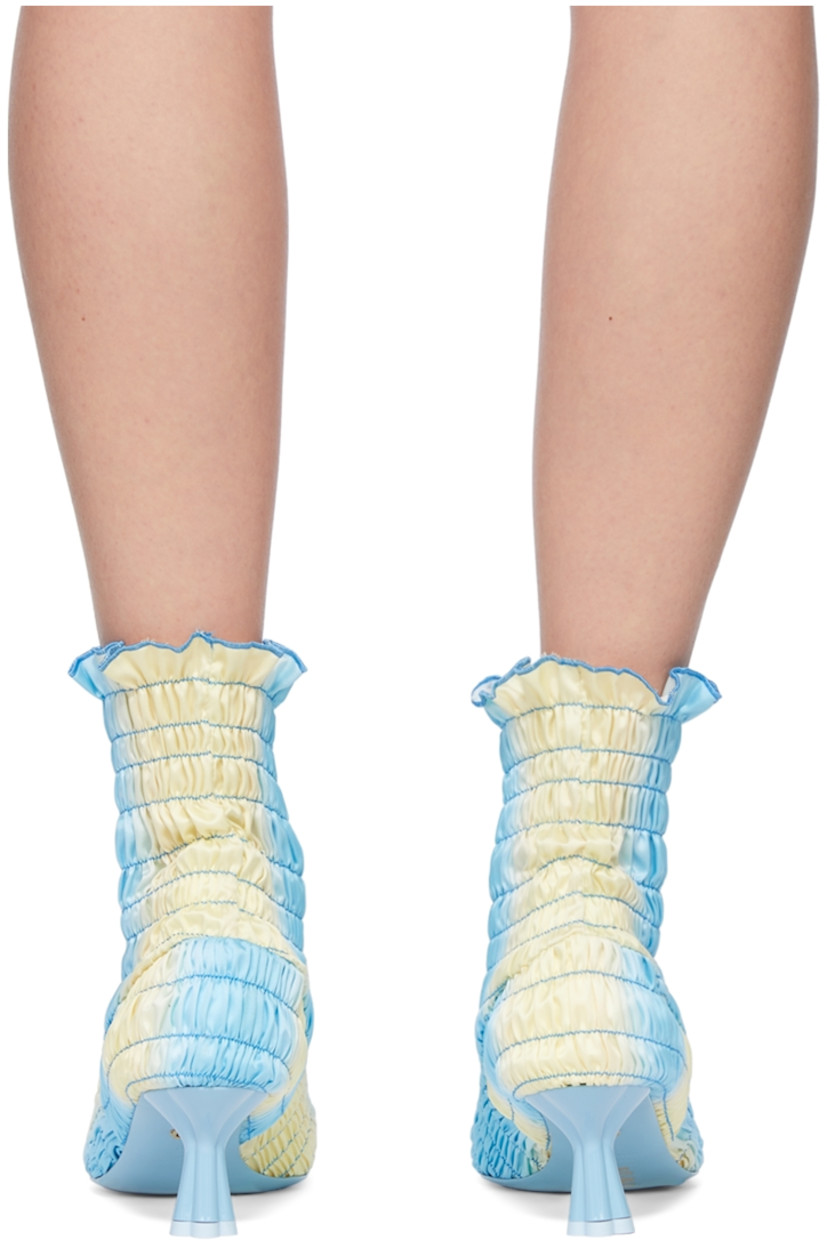 Ankle-high shirred stretch twill slip-on boots featuring graphic pattern in tones of blue and yellow.

· Pointed toe
· Covered kitten heel
· Heel: 2 in 

Supplier color: Blue/Yellow