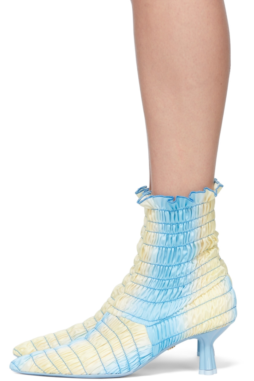 Ankle-high shirred stretch twill slip-on boots featuring graphic pattern in tones of blue and yellow.

· Pointed toe
· Covered kitten heel
· Heel: 2 in 

Supplier color: Blue/Yellow