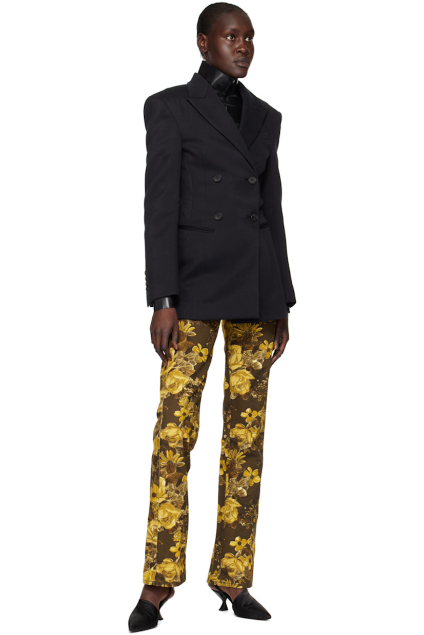 Cotton and nylon-blend jersey blazer. 

· Peaked lapel
· Double-breasted button closure
· Twin darts at front
· Welt pockets
· Padded shoulders
· Four-button surgeon's cuffs
· Central vent at back hem
· Full cotton-blend satin lining

Supplier color: Black