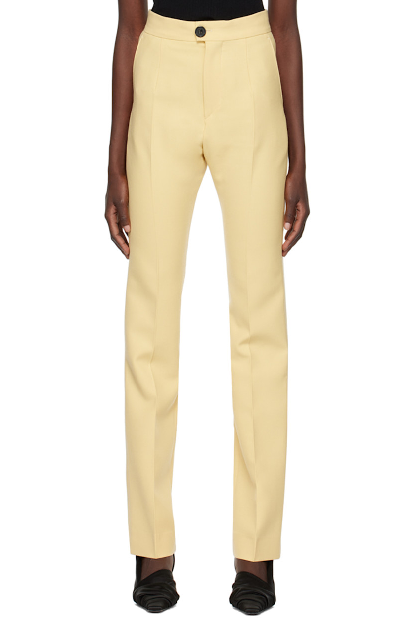 Plain-woven stretch polyester and virgin wool-blend trousers.

· Four-pocket styling
· Zip-fly
· Central creases at front and back

Supplier color: Yellow