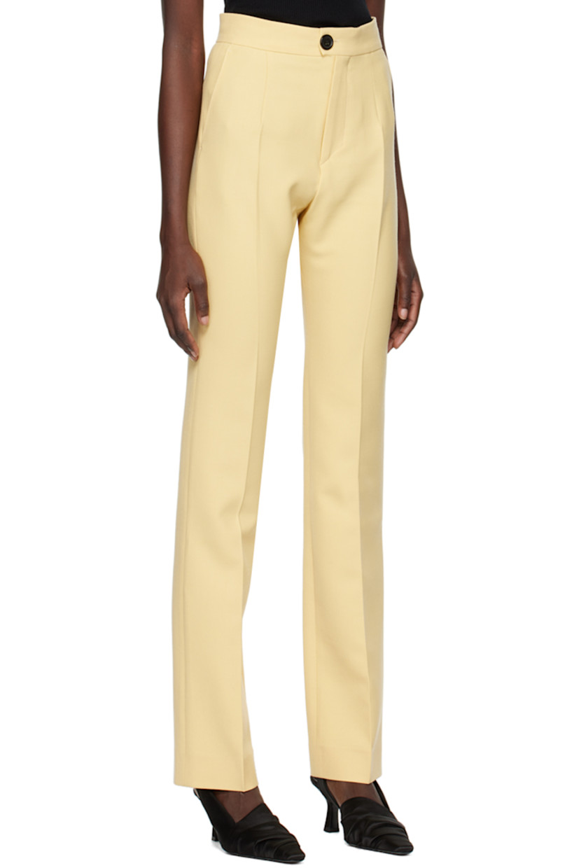 Plain-woven stretch polyester and virgin wool-blend trousers.

· Four-pocket styling
· Zip-fly
· Central creases at front and back

Supplier color: Yellow