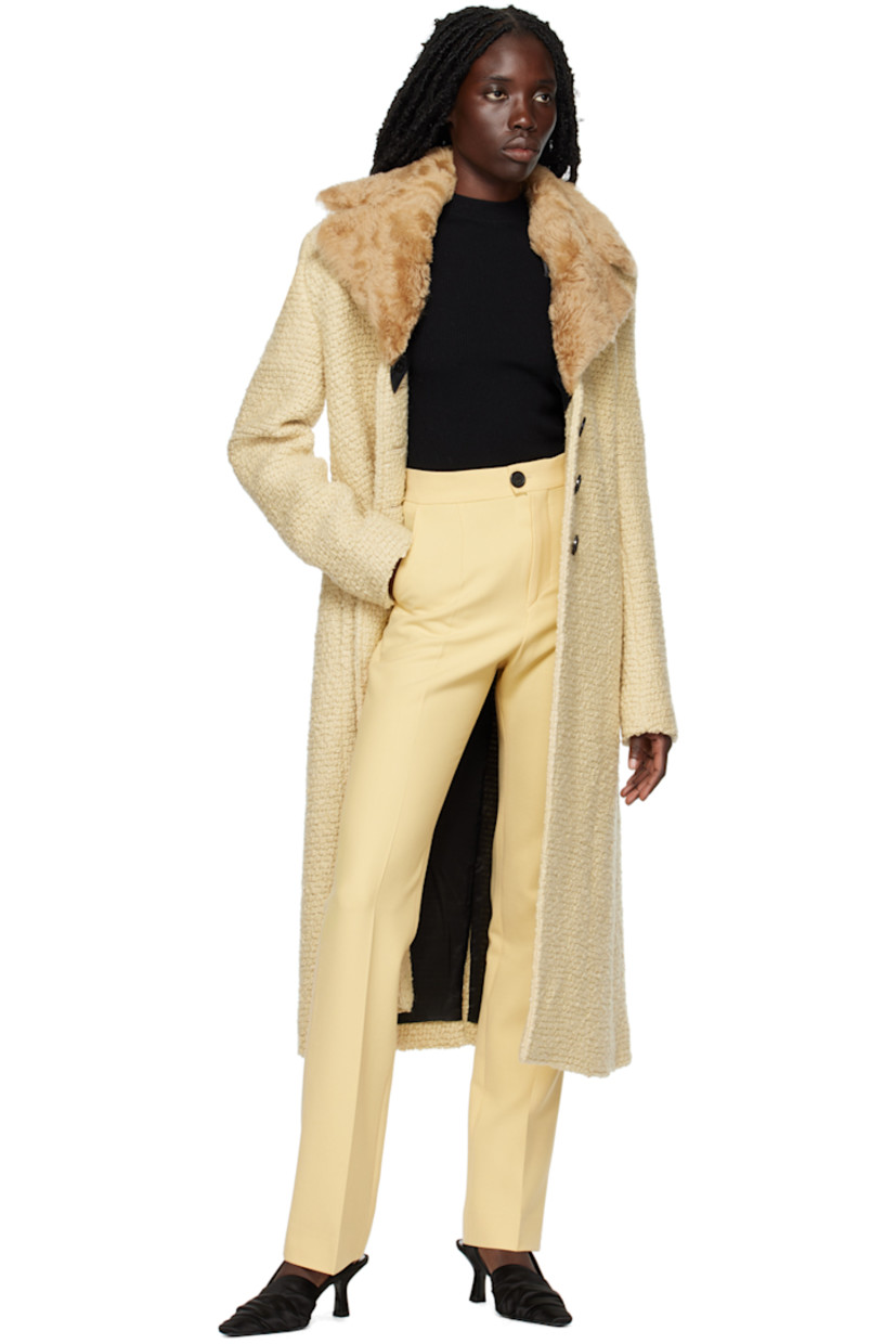 Plain-woven stretch polyester and virgin wool-blend trousers.

· Four-pocket styling
· Zip-fly
· Central creases at front and back

Supplier color: Yellow