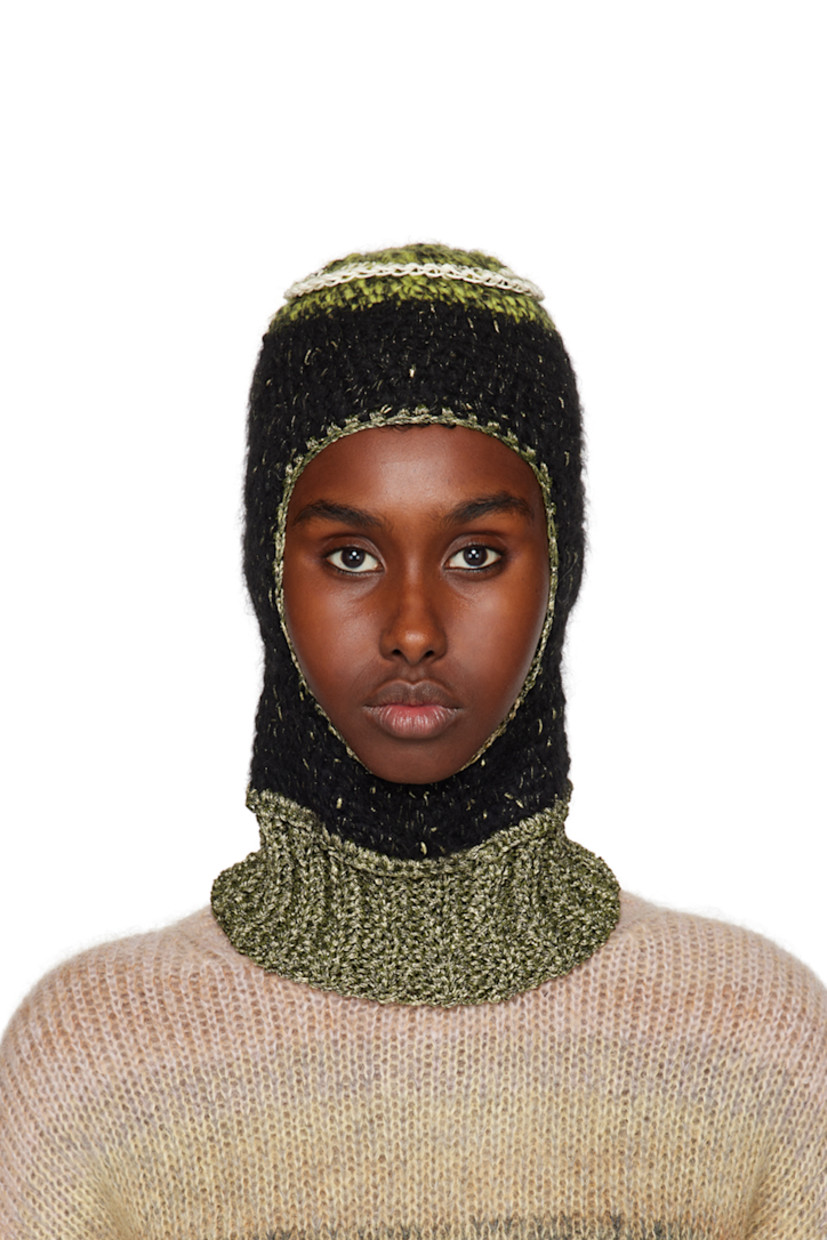 Rib knit upcycled hemp twine, wool, cotton, and polyester balaclava in black. Gold-tone metallic thread detailing throughout.

· Textile logo flag at back face
· Unlined

Face masks and face coverings are final sale and are not eligible for return or exchange.

Supplier color: Black/Gold