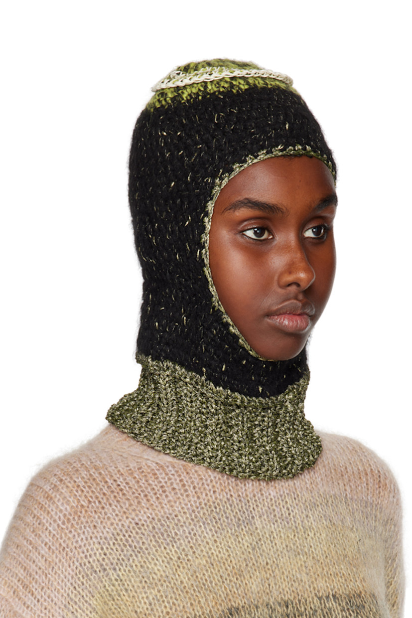 Rib knit upcycled hemp twine, wool, cotton, and polyester balaclava in black. Gold-tone metallic thread detailing throughout.

· Textile logo flag at back face
· Unlined

Face masks and face coverings are final sale and are not eligible for return or exchange.

Supplier color: Black/Gold