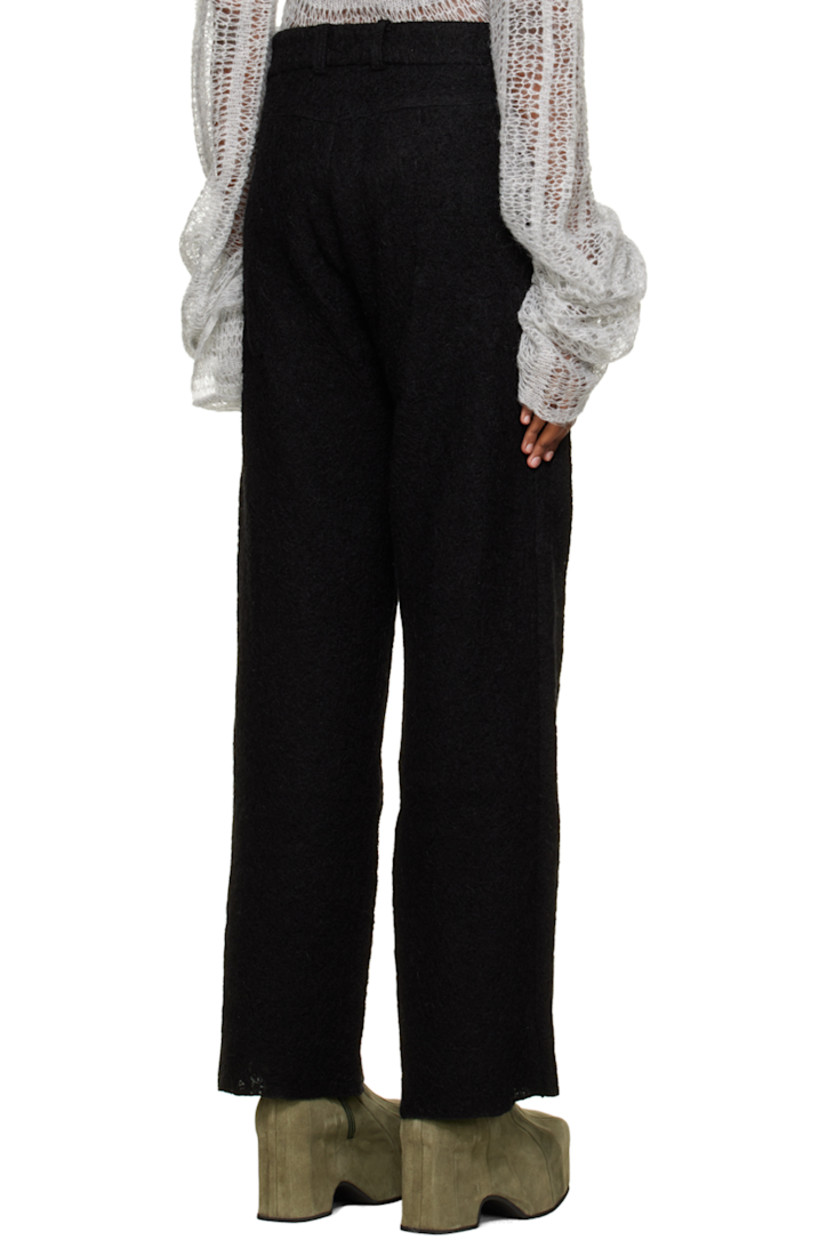 Felted wool trousers.

· Belt loops
· Two-pocket styling
· Zip-fly
· Partial satin lining

Supplier color: Black