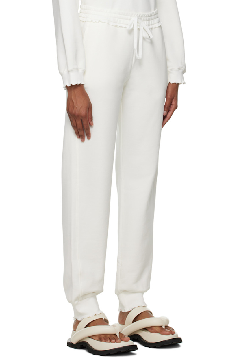 French terry lounge pants. Scalloped edges throughout.

· Drawstring at elasticized waistband
· Two-pocket styling

Supplier color: White chalk