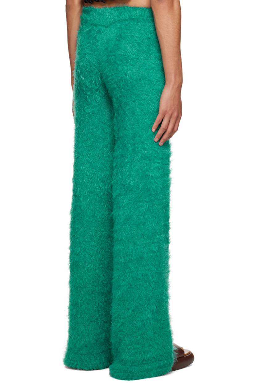 Shag knit nylon trousers. Rib knit elasticized waistband.

Available exclusively at SSENSE.

Supplier color: Dark teal