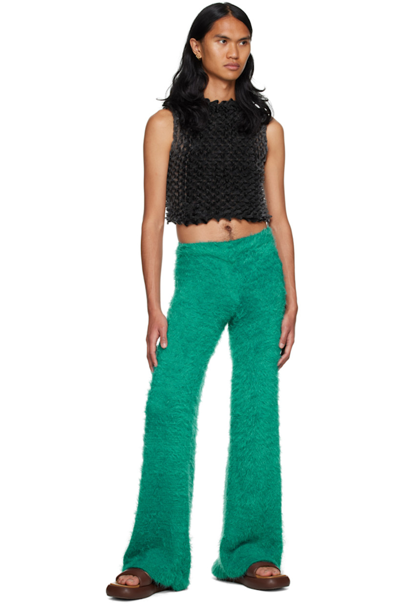 Shag knit nylon trousers. Rib knit elasticized waistband.

Available exclusively at SSENSE.

Supplier color: Dark teal
