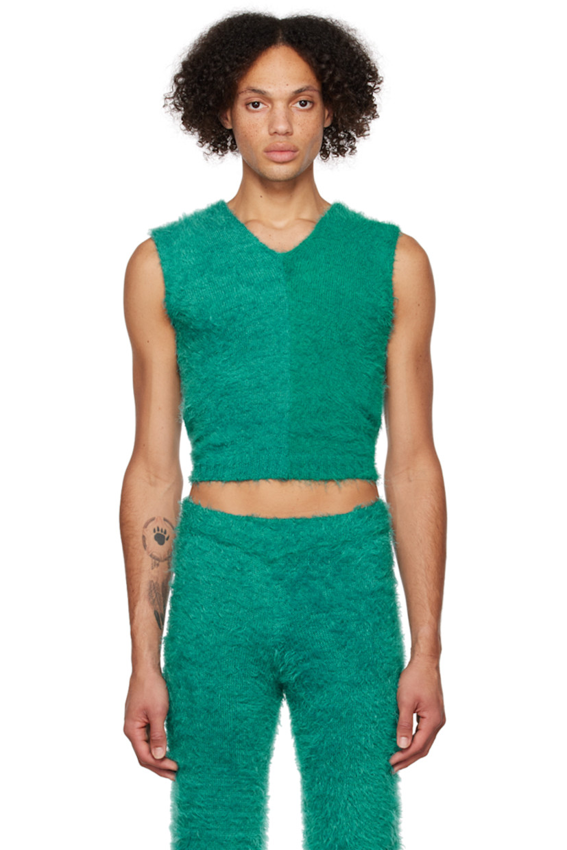 Shag knit nylon hoodie. 

· V-neck
· Rib knit hem

Available exclusively at SSENSE. 

Supplier color: Dark teal