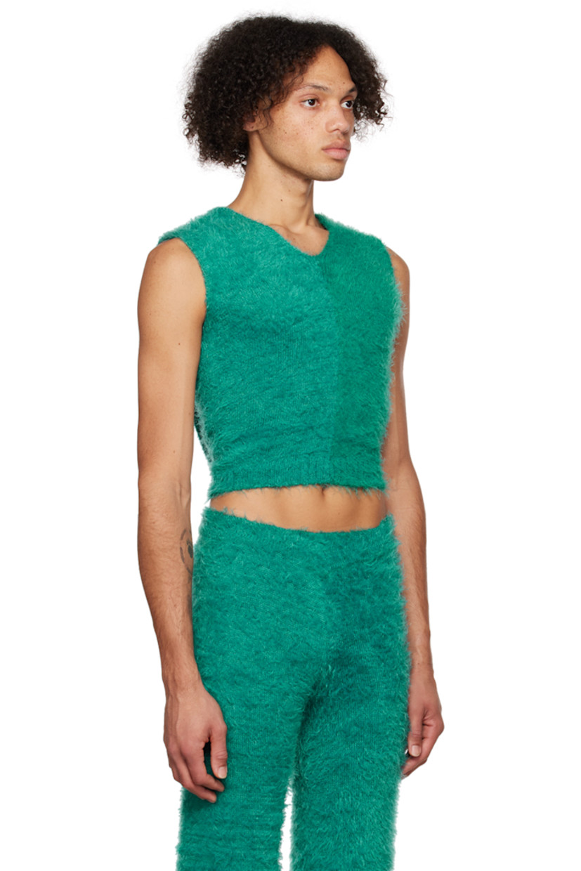 Shag knit nylon hoodie. 

· V-neck
· Rib knit hem

Available exclusively at SSENSE. 

Supplier color: Dark teal