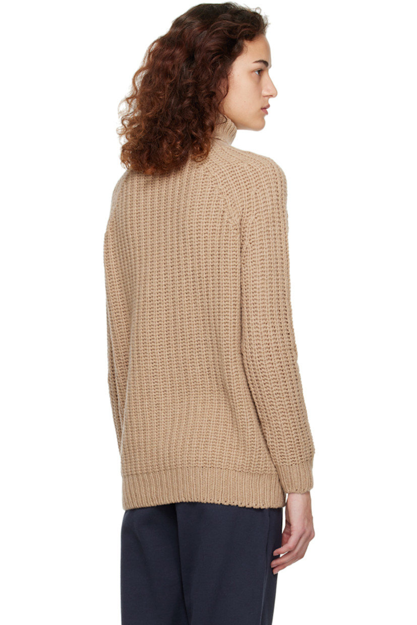Rib knit lambswool sweater. 

· Rolled turtleneck
· Raglan sleeves

Supplier color: Light camel