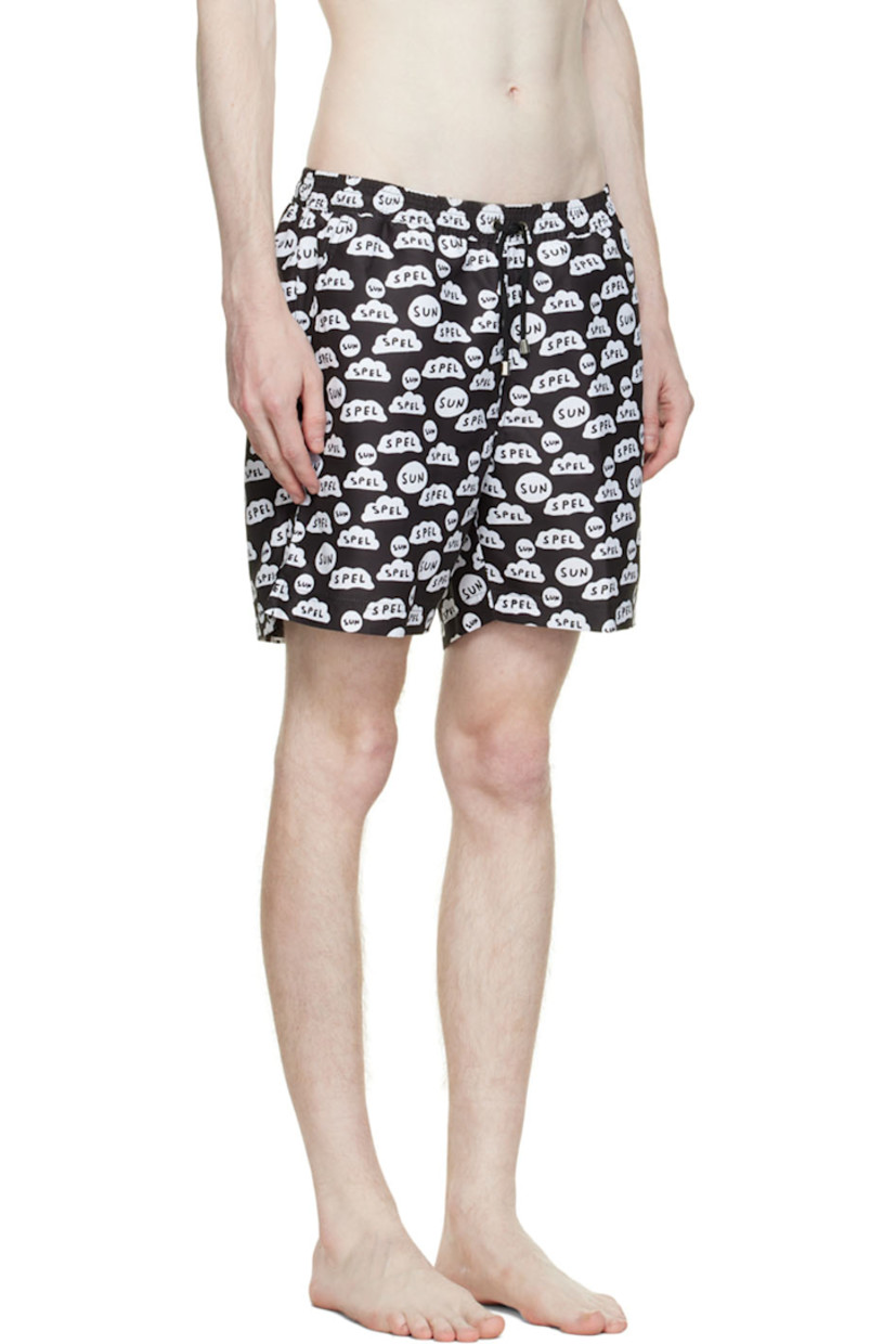 Recycled polyester taffeta swim shorts. Graphic pattern throughout.

· Drawstring at elasticized waistband
· Three-pocket styling
· Vented outseams
· Partial mesh lining

Featuring artwork by David Shrigley.

Available exclusively at SSENSE.

Supplier color: Bkaz black ds sun