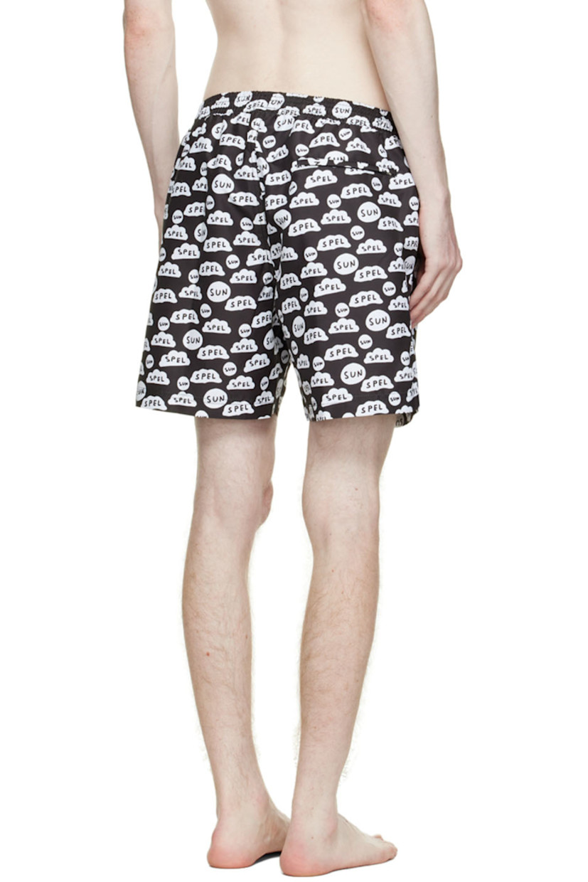 Recycled polyester taffeta swim shorts. Graphic pattern throughout.

· Drawstring at elasticized waistband
· Three-pocket styling
· Vented outseams
· Partial mesh lining

Featuring artwork by David Shrigley.

Available exclusively at SSENSE.

Supplier color: Bkaz black ds sun