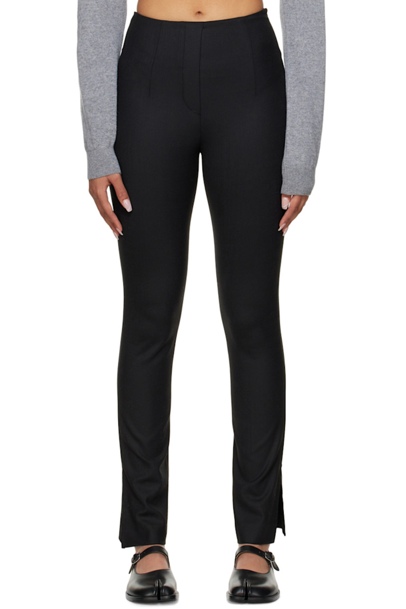 Stretch wool-blend twill trousers. 

· Two-pocket styling
· Twin darts at front and back
· Zip closure at outseam
· Vented cuffs

Supplier color: Black