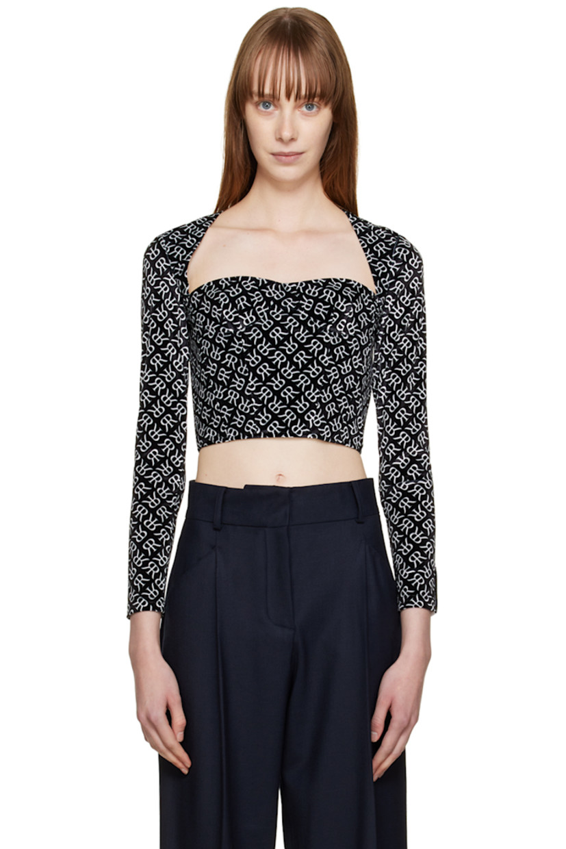 Polyester velvet blouse. Logo pattern printed throughout.

· Square neck 
· Underwire at cups
· Boning at front and back 
· Textile logo patch at cuff
· Zip closure at back

Supplier color: Black with white emblem