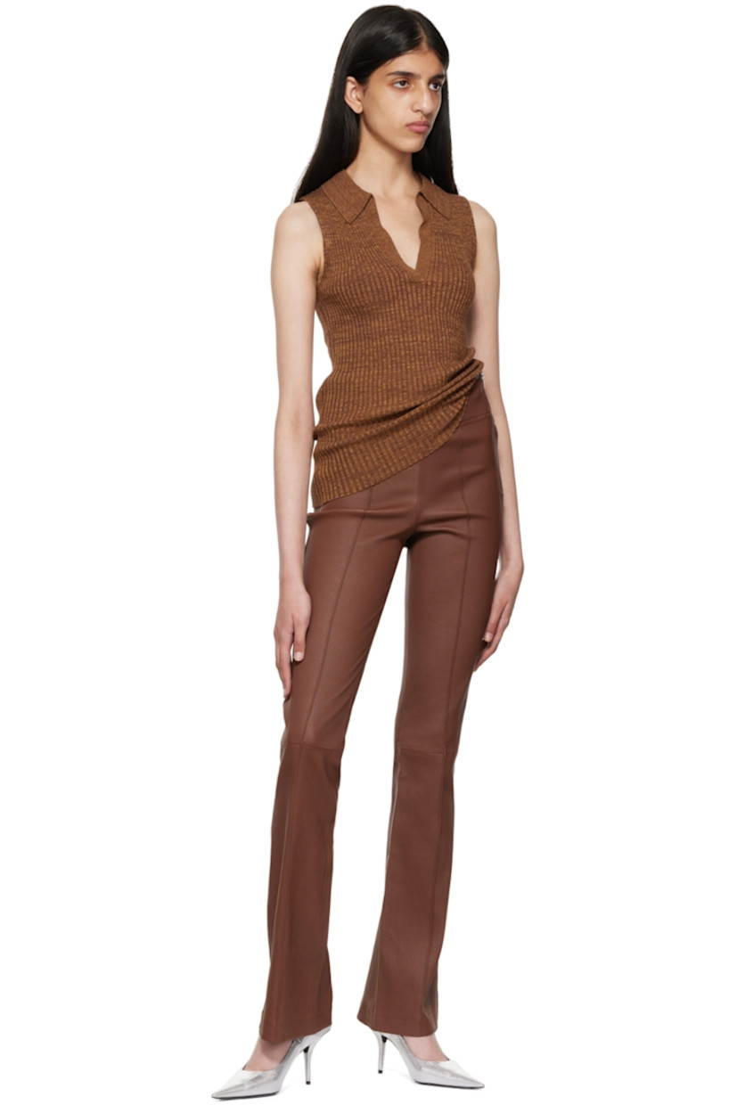 Paneled  grained lambskin leather pants. 

· High-rise
· Pinched seams at front
· Zip closure at outseam
· Flared hem
· Full stretch cotton jersey lining

Supplier color: Cinnamon