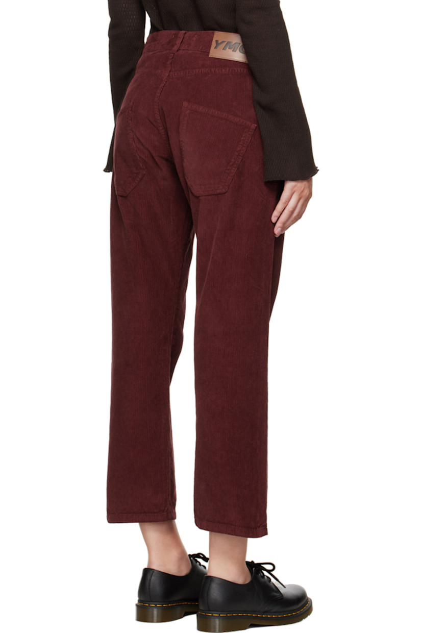 Cotton corduroy trousers in burgundy.

· Belt loops 
· Five-pocket styling
· Zip-fly
· Leather logo patch at back waist 

Supplier color: Burgundy