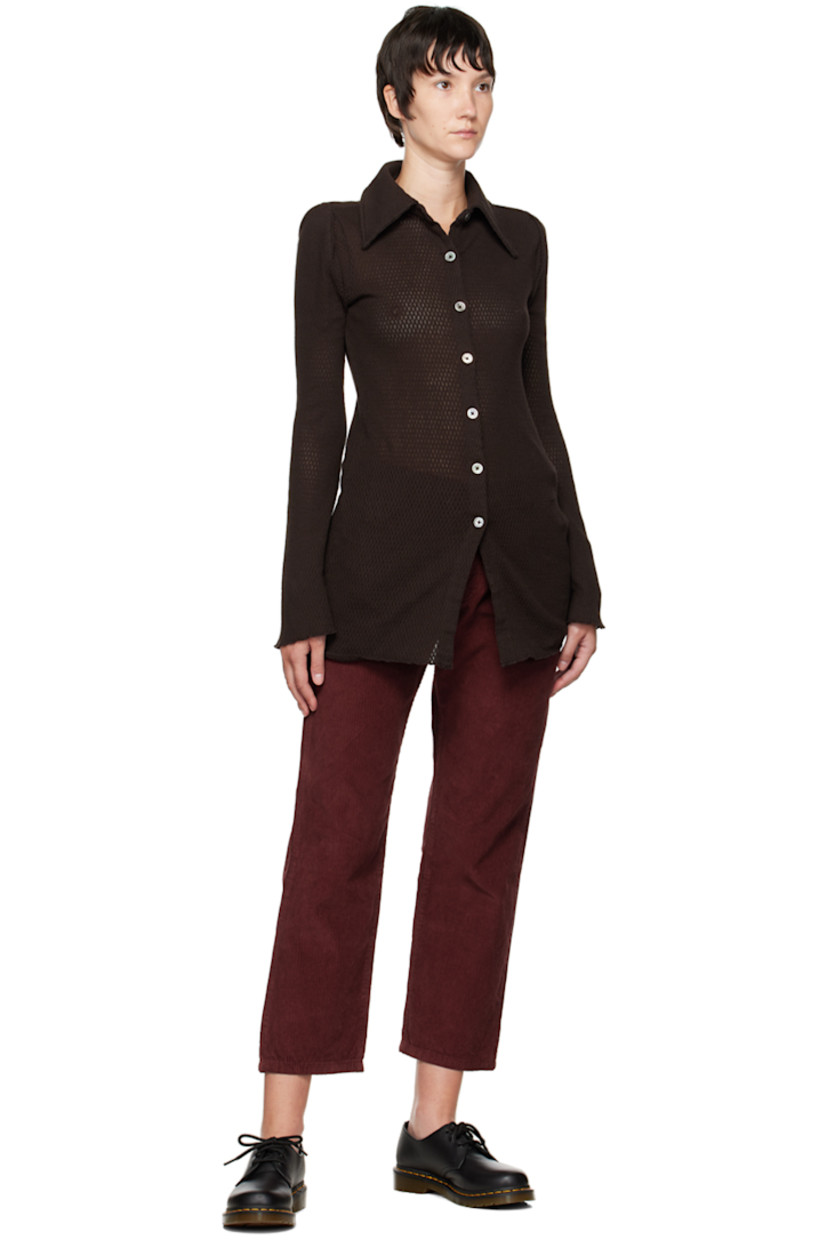 Cotton corduroy trousers in burgundy.

· Belt loops 
· Five-pocket styling
· Zip-fly
· Leather logo patch at back waist 

Supplier color: Burgundy