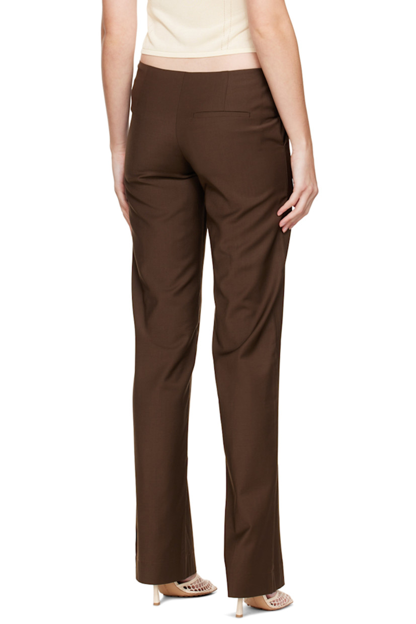 Plain-woven wool-blend trousers.

· Lace-up detailing at front waistband
· Three-pocket styling 
· Pinched seams at front legs
· Zip closure at outseam 

Supplier color: Chocolate