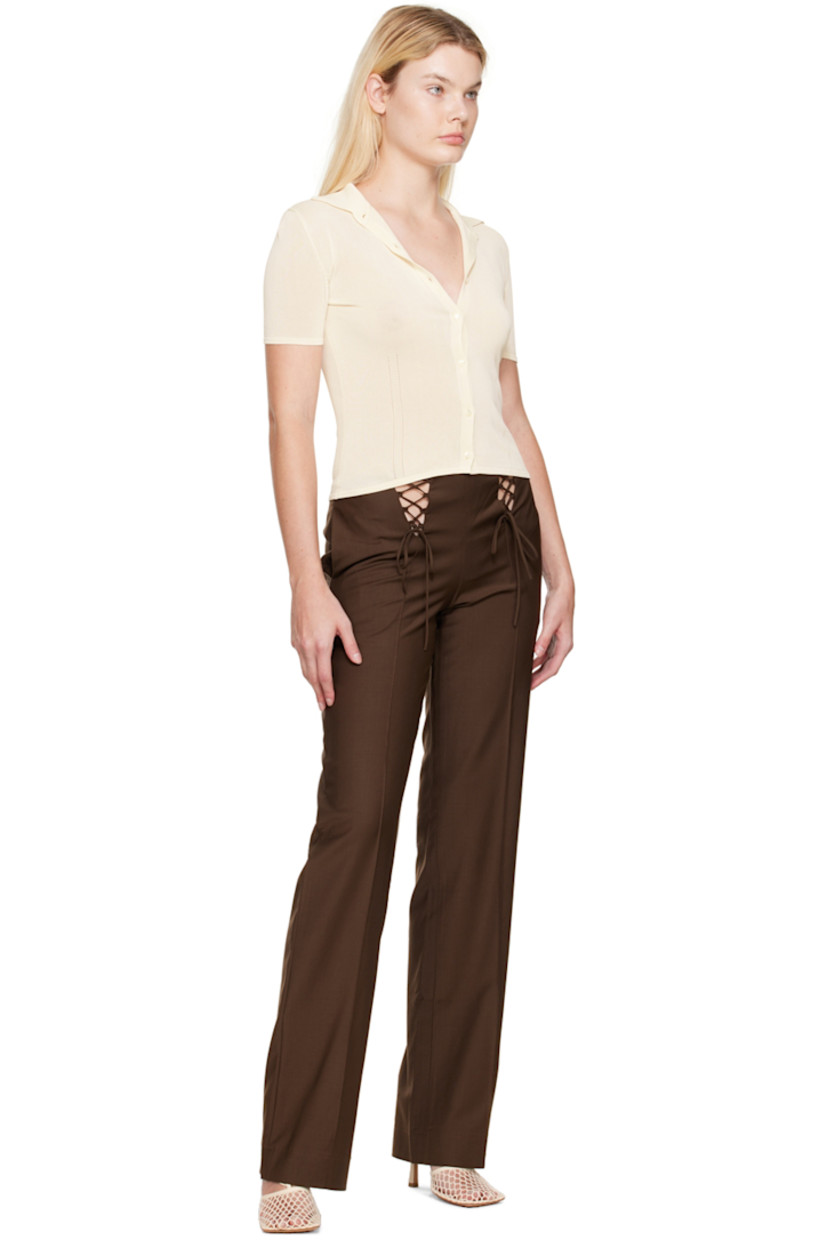 Plain-woven wool-blend trousers.

· Lace-up detailing at front waistband
· Three-pocket styling 
· Pinched seams at front legs
· Zip closure at outseam 

Supplier color: Chocolate