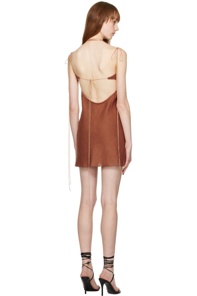 Plain-woven linen dress. Elasticized scalloped trim throughout.

· Layered construction
· Sweetheart neck
· Adjustable elasticized halter strap
· Self-tie fastening at shoulders and low back
· Gold-tone hardware

Supplier color: Terracotta