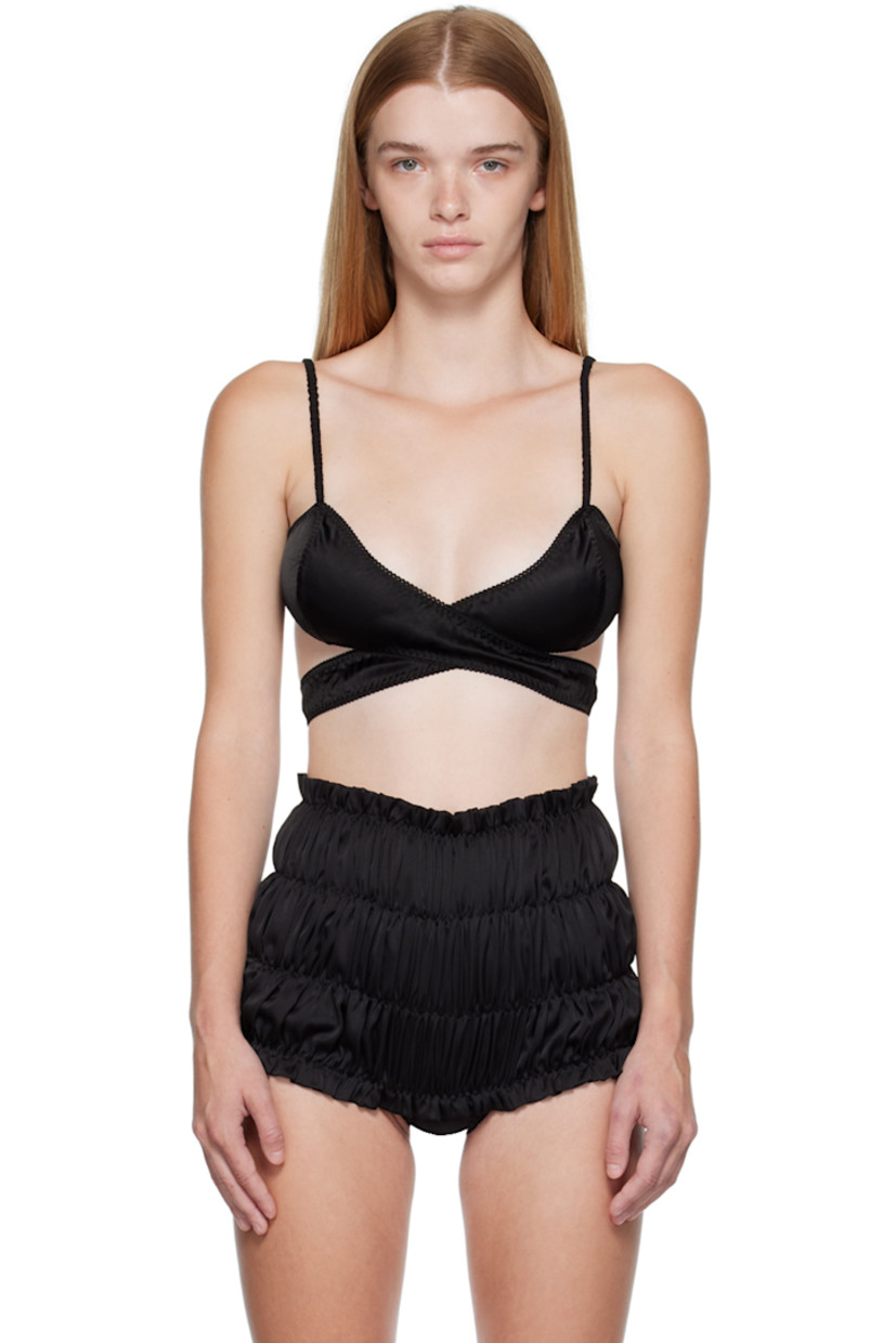 Viscose satin camisole. Scalloped edges throughout. 

· Wrap construction 
· Elasticized spaghetti straps
· Hook-eye fastening at back

Supplier color: Black