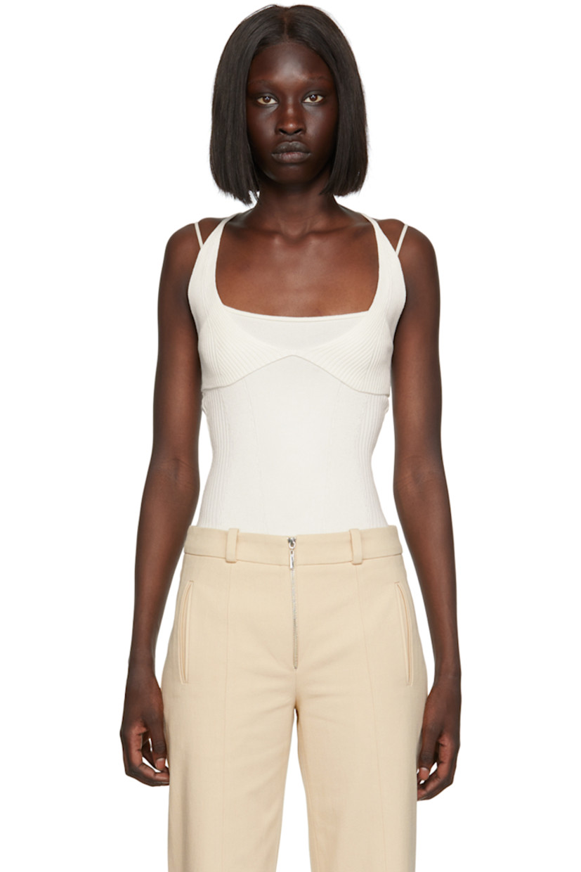 Rib knit stretch viscose bodysuit.

· Layered construction
· V-neck
· Press-stud closure at bottom
· Fixed criss-crossing spaghetti straps
· Self-tie fastening and cutout at back

Supplier color: White