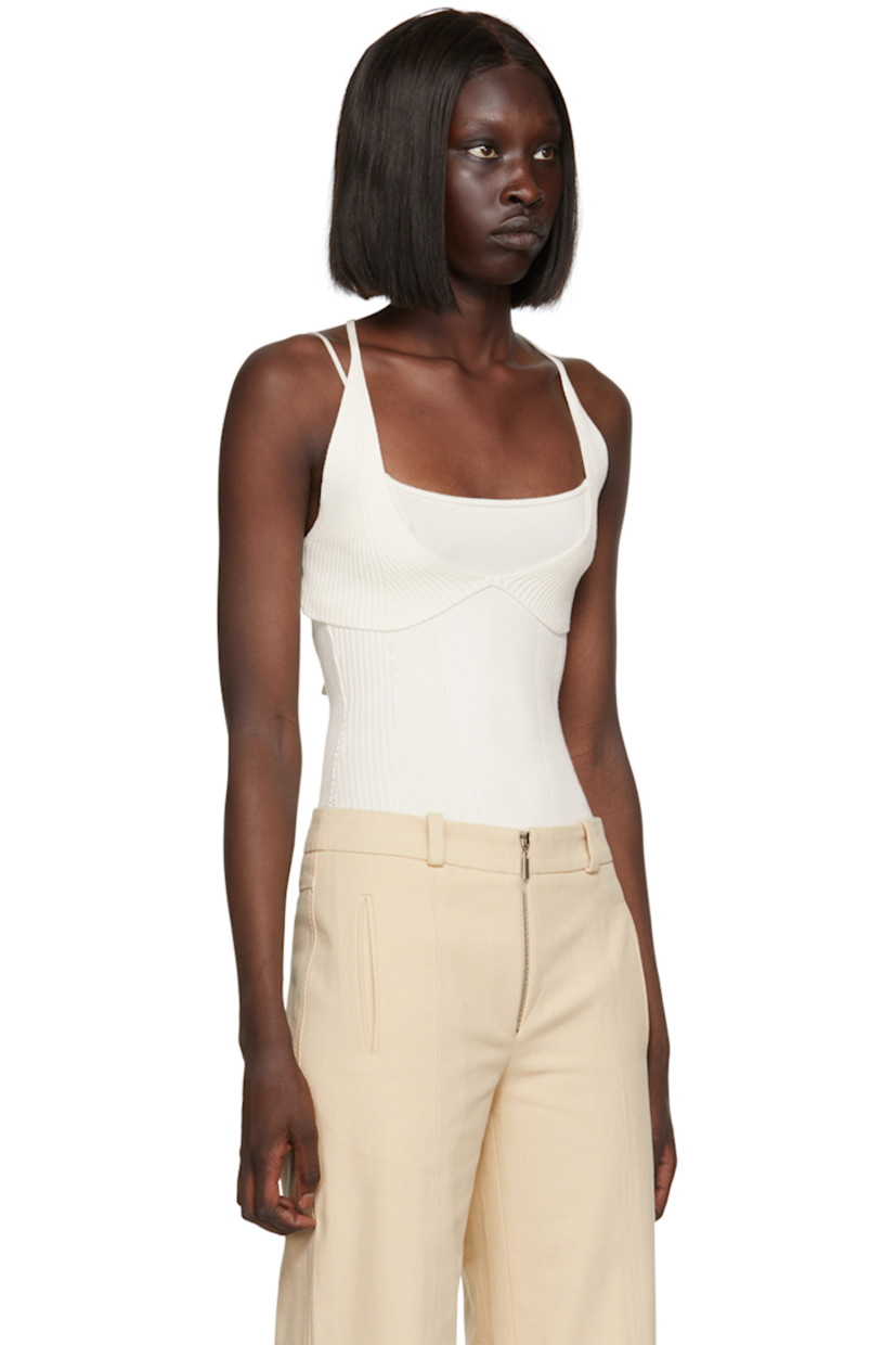 Rib knit stretch viscose bodysuit.

· Layered construction
· V-neck
· Press-stud closure at bottom
· Fixed criss-crossing spaghetti straps
· Self-tie fastening and cutout at back

Supplier color: White