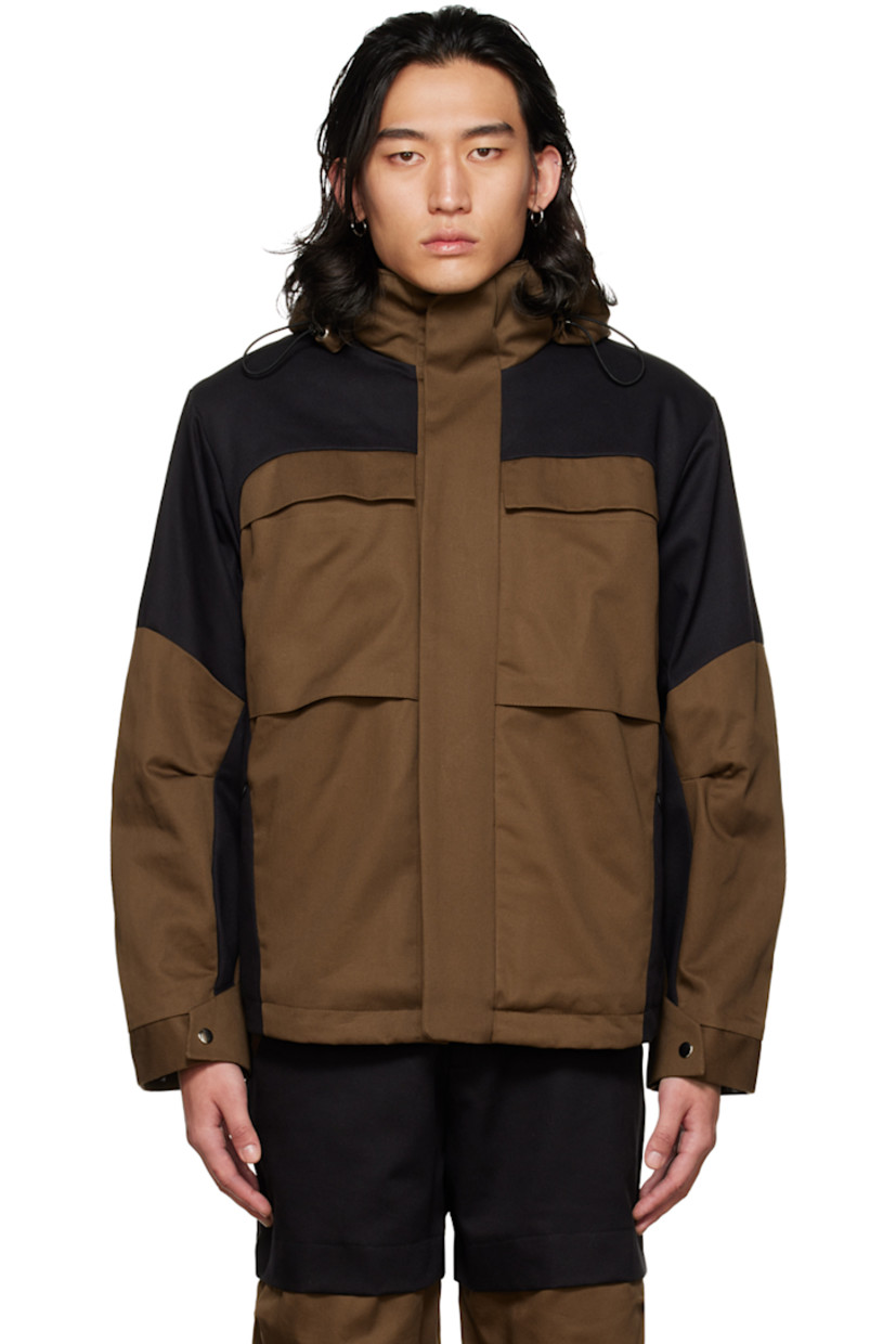 Cotton-blend twill jacket. 

· Paneled construction
· Bungee-style drawstring at hood
· Concealed zip closure
· Flap pockets at chest
· Zip pockets at waist 
· Press-stud tab at cuffs 
· Fleece lining

Supplier color: Black/Brown