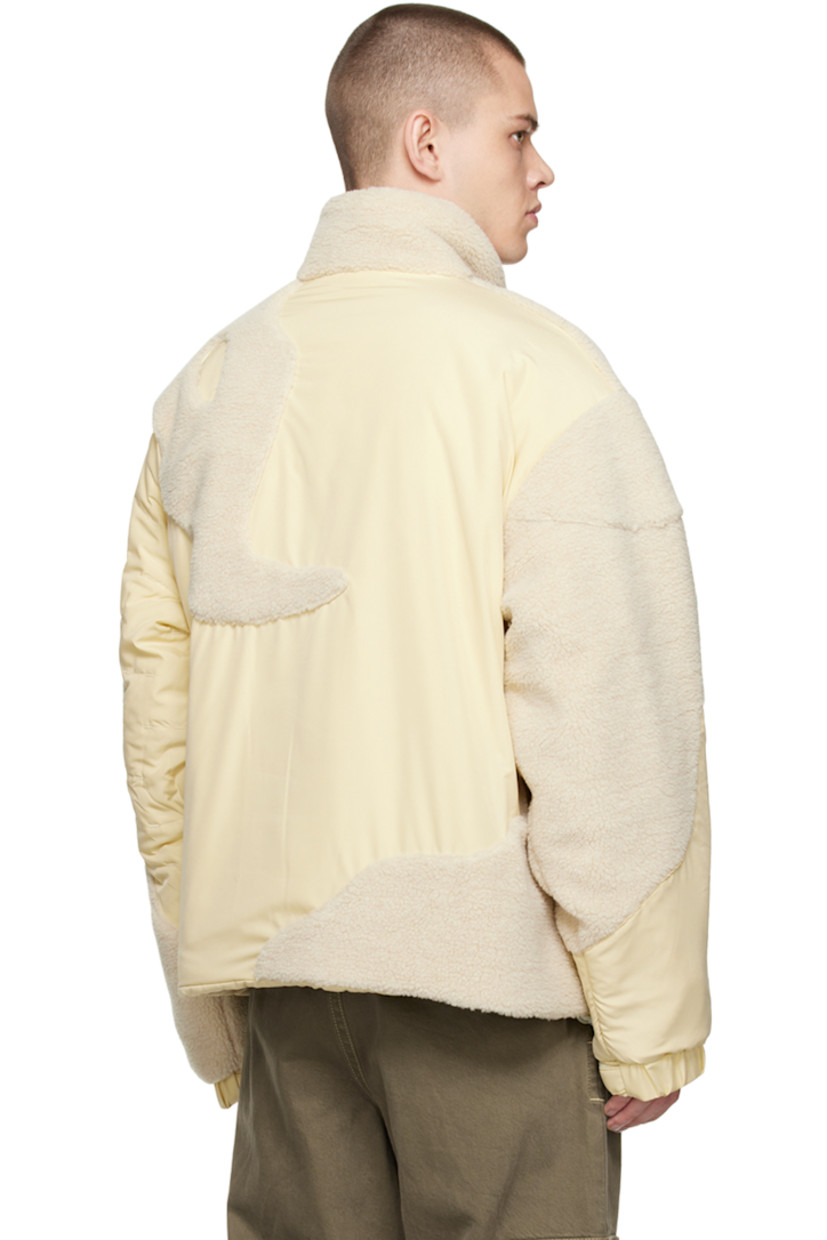 Polyester taffeta and sherpa fleece jacket. Top stitching throughout.

· Paneled construction
· Stand collar
· Offset two-way zip closure
· Welt pockets
· Concealed bungee-style drawstring at hem
· Dropped shoulders
· Velcro tab at cuffs
· Zip pocket at interior
· Full quilted satin lining

Available exclusively at SSENSE.

Supplier color: Beige