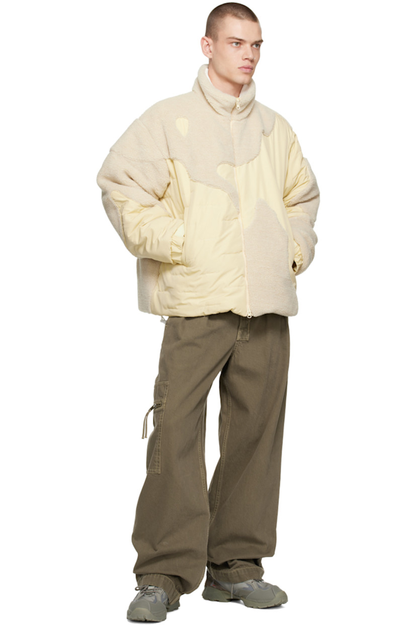 Polyester taffeta and sherpa fleece jacket. Top stitching throughout.

· Paneled construction
· Stand collar
· Offset two-way zip closure
· Welt pockets
· Concealed bungee-style drawstring at hem
· Dropped shoulders
· Velcro tab at cuffs
· Zip pocket at interior
· Full quilted satin lining

Available exclusively at SSENSE.

Supplier color: Beige