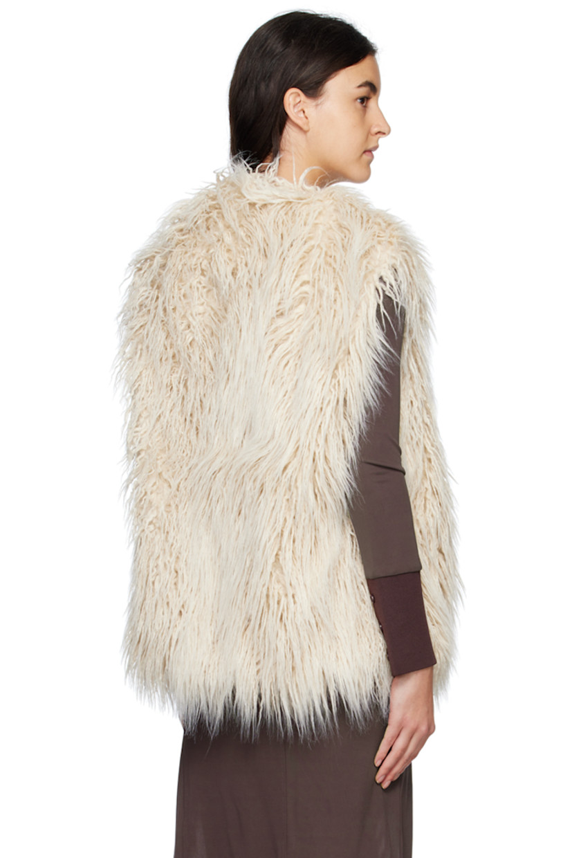 Acrylic-blend faux-fur vest. 

· V-neck 
· Concealed hook-eye closure 
· Welt pockets 
· Full satin lining 

Supplier color: Cream