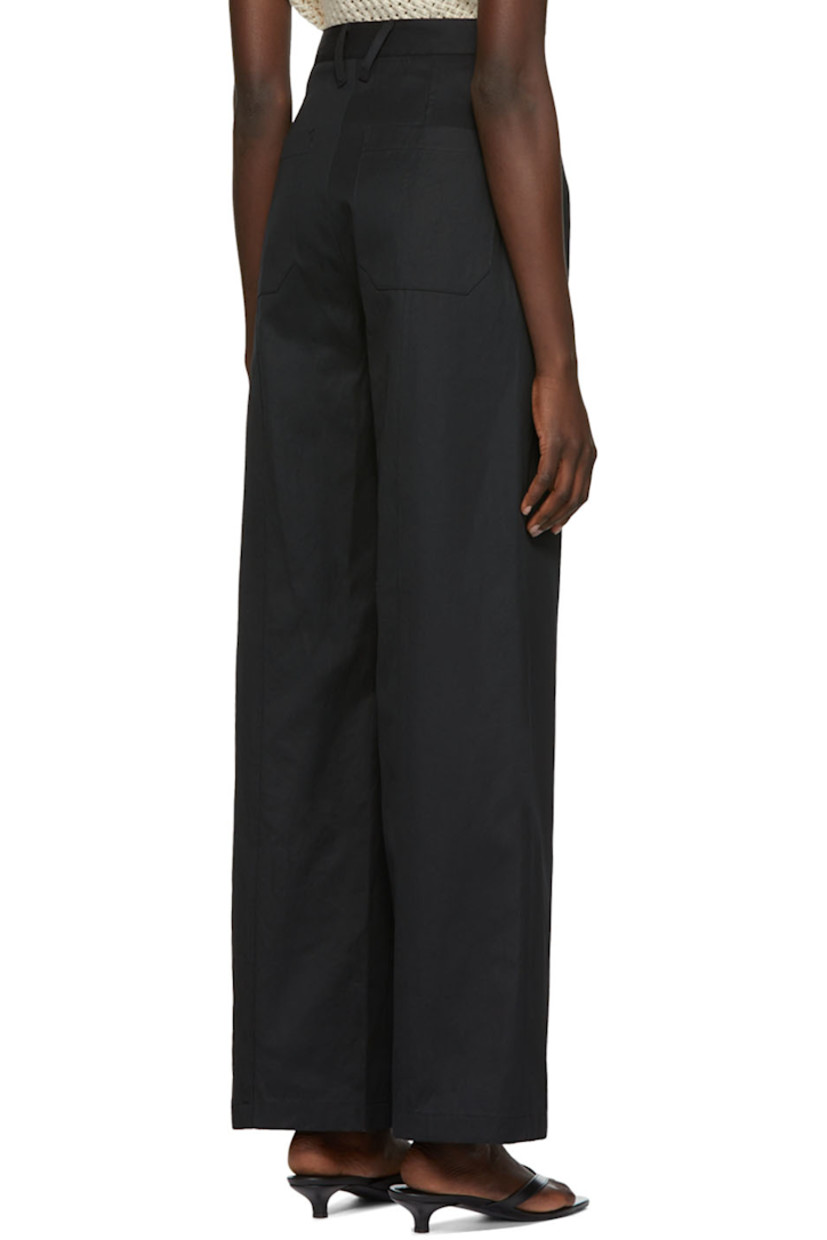 Cotton twill trousers. 

· Belt loops 
· Four-pocket styling 
· Zip-fly 
· Pinched seams at front 

Supplier color: Black