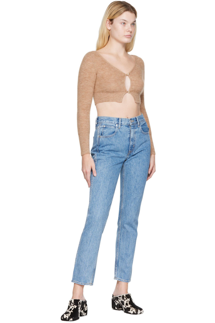Non-stretch denim jeans. 

· Belt loops
· Five-pocket styling
· Zip-fly
· Logo-engraved silver-tone hardware
·Contrast stitching in tan

Supplier color: Daydream