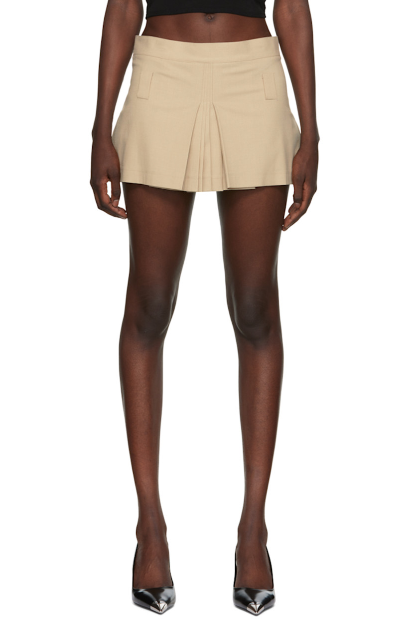Pleated plain-woven stretch polyester skirt.

· Belt loops
· Two-pocket styling
· Zip closure at back 
· Full satin lining

Supplier color: Beige