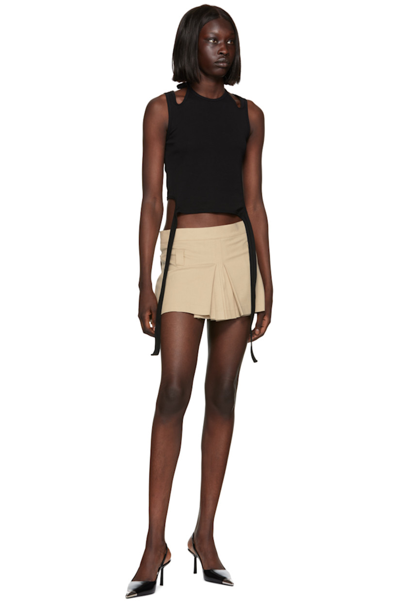 Pleated plain-woven stretch polyester skirt.

· Belt loops
· Two-pocket styling
· Zip closure at back 
· Full satin lining

Supplier color: Beige