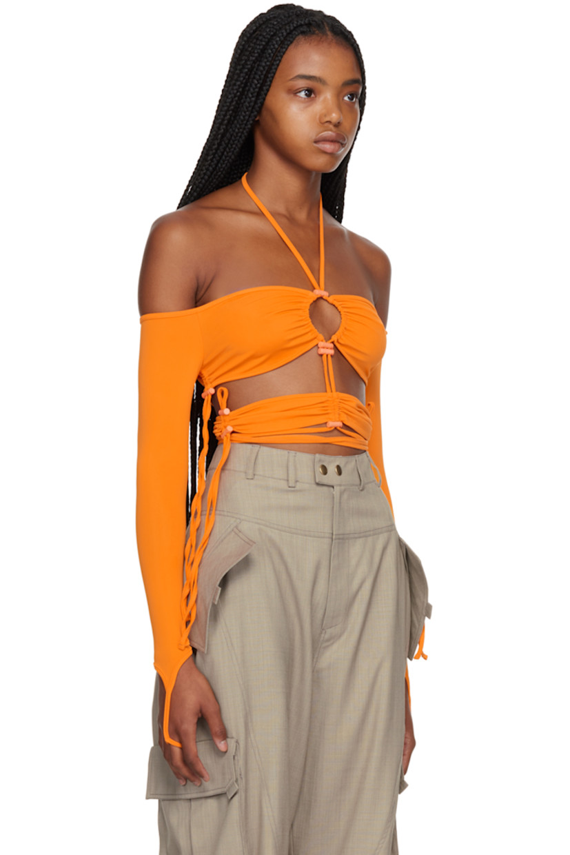 Nylon-blend jersey off-the-shoulder T-shirt. Bungee-style drawstrings throughout. 

· Self-tie halter straps 
· Ruching and cutout at chest 
· Wraparound self-tie straps
· Finger loop at cuffs

Supplier color: Orange