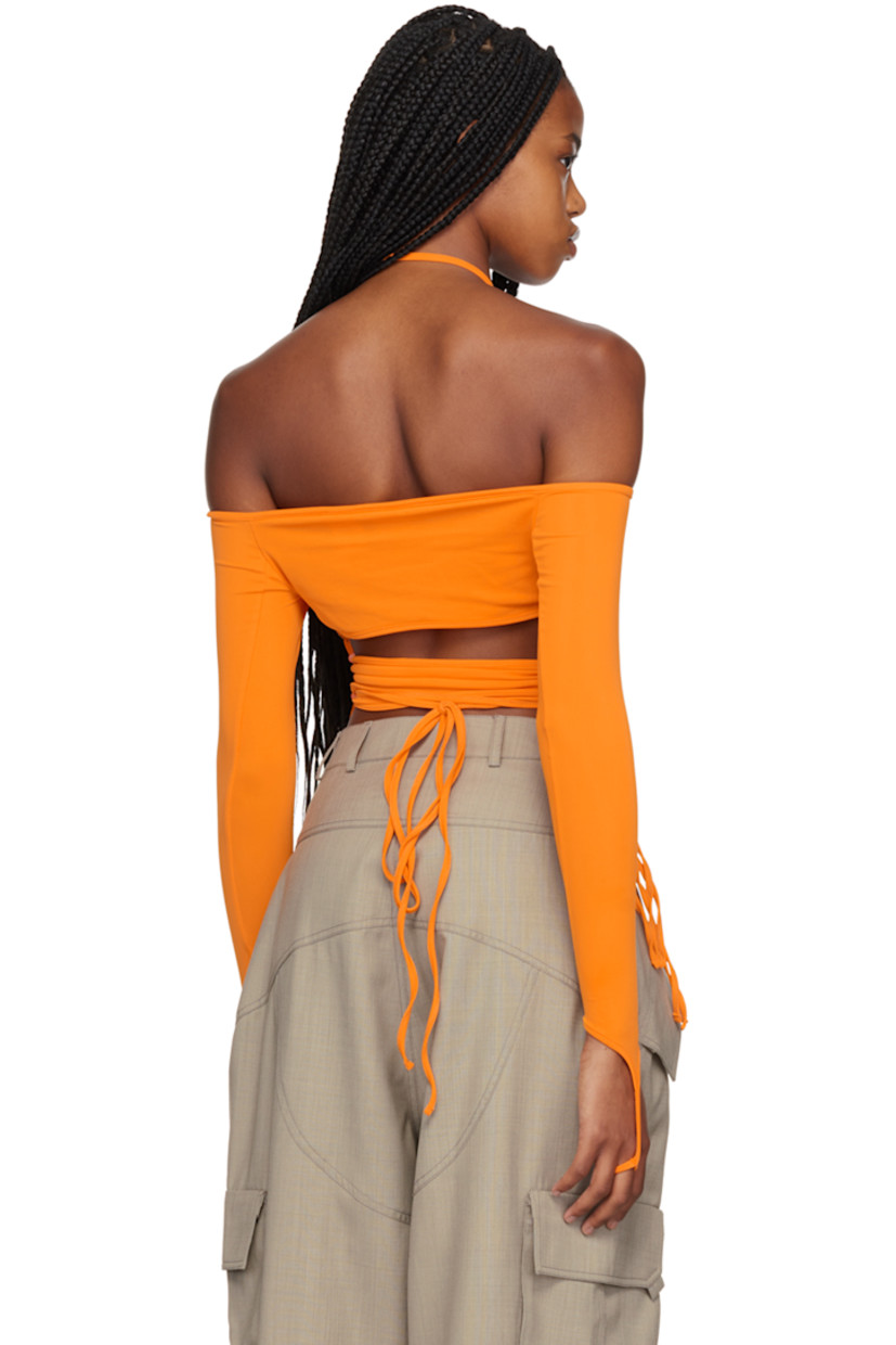 Nylon-blend jersey off-the-shoulder T-shirt. Bungee-style drawstrings throughout. 

· Self-tie halter straps 
· Ruching and cutout at chest 
· Wraparound self-tie straps
· Finger loop at cuffs

Supplier color: Orange