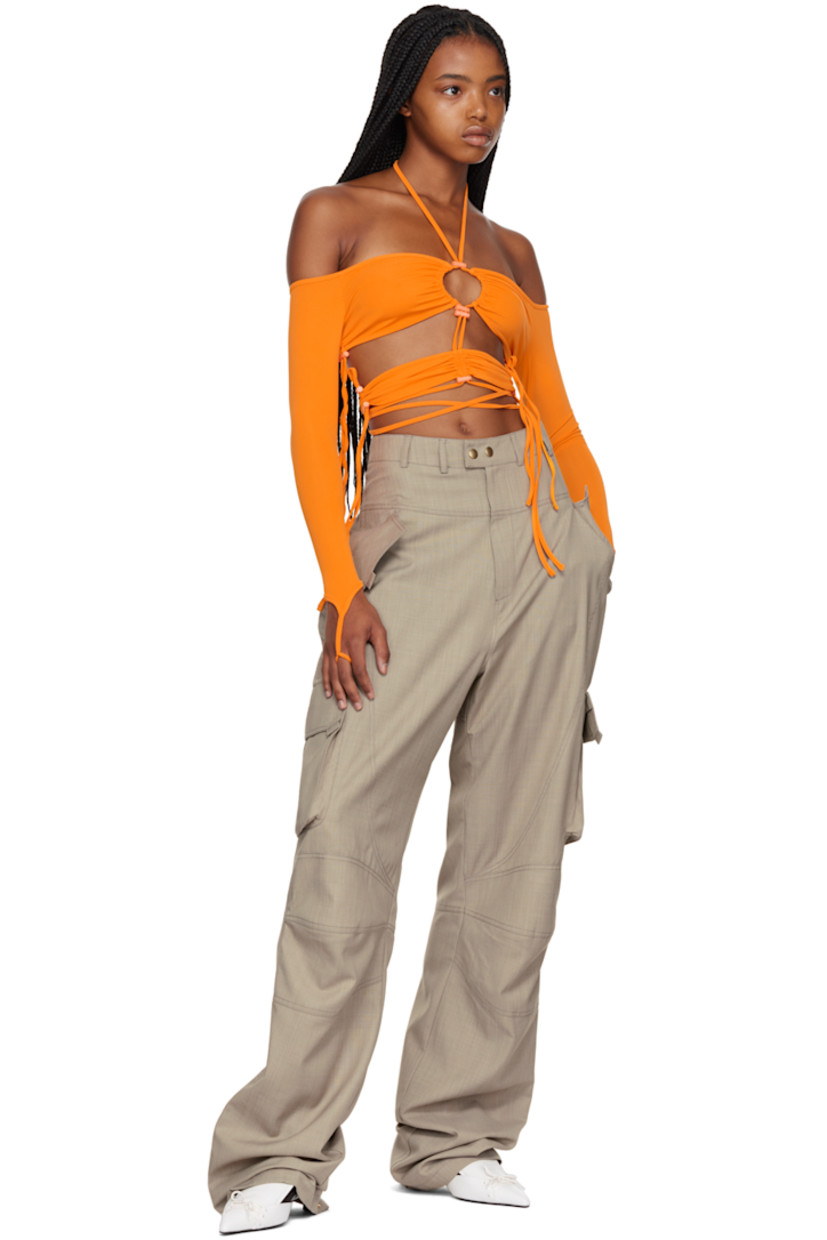 Nylon-blend jersey off-the-shoulder T-shirt. Bungee-style drawstrings throughout. 

· Self-tie halter straps 
· Ruching and cutout at chest 
· Wraparound self-tie straps
· Finger loop at cuffs

Supplier color: Orange