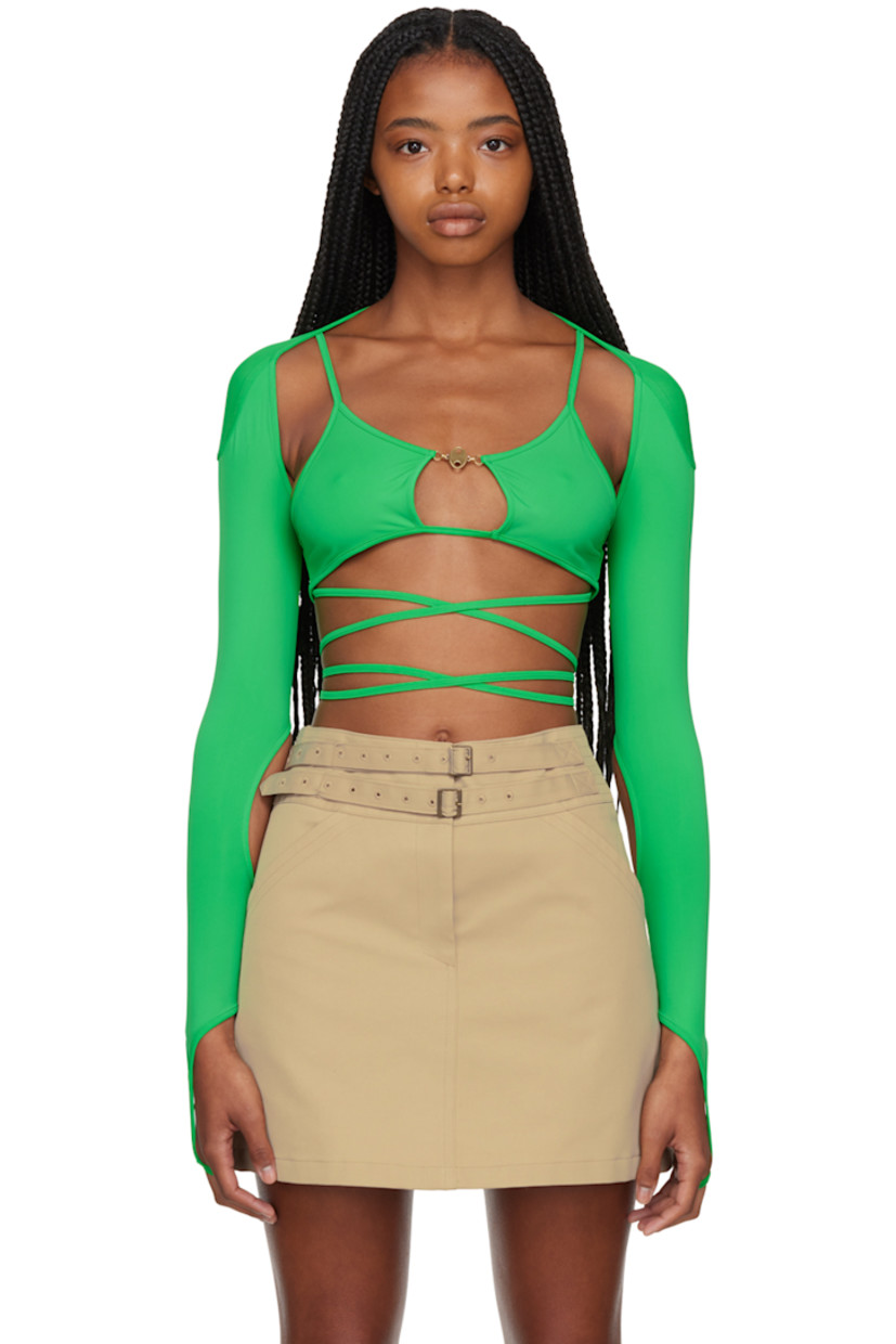 Nylon jersey T-shirt.

· Logo hardware at scoop neck
· Cut-out at front 
· Removable bolero-style sleeves with finger loops
· Wrap-around self-tie strap at back 
· Brass-tone hardware

Supplier: Green
