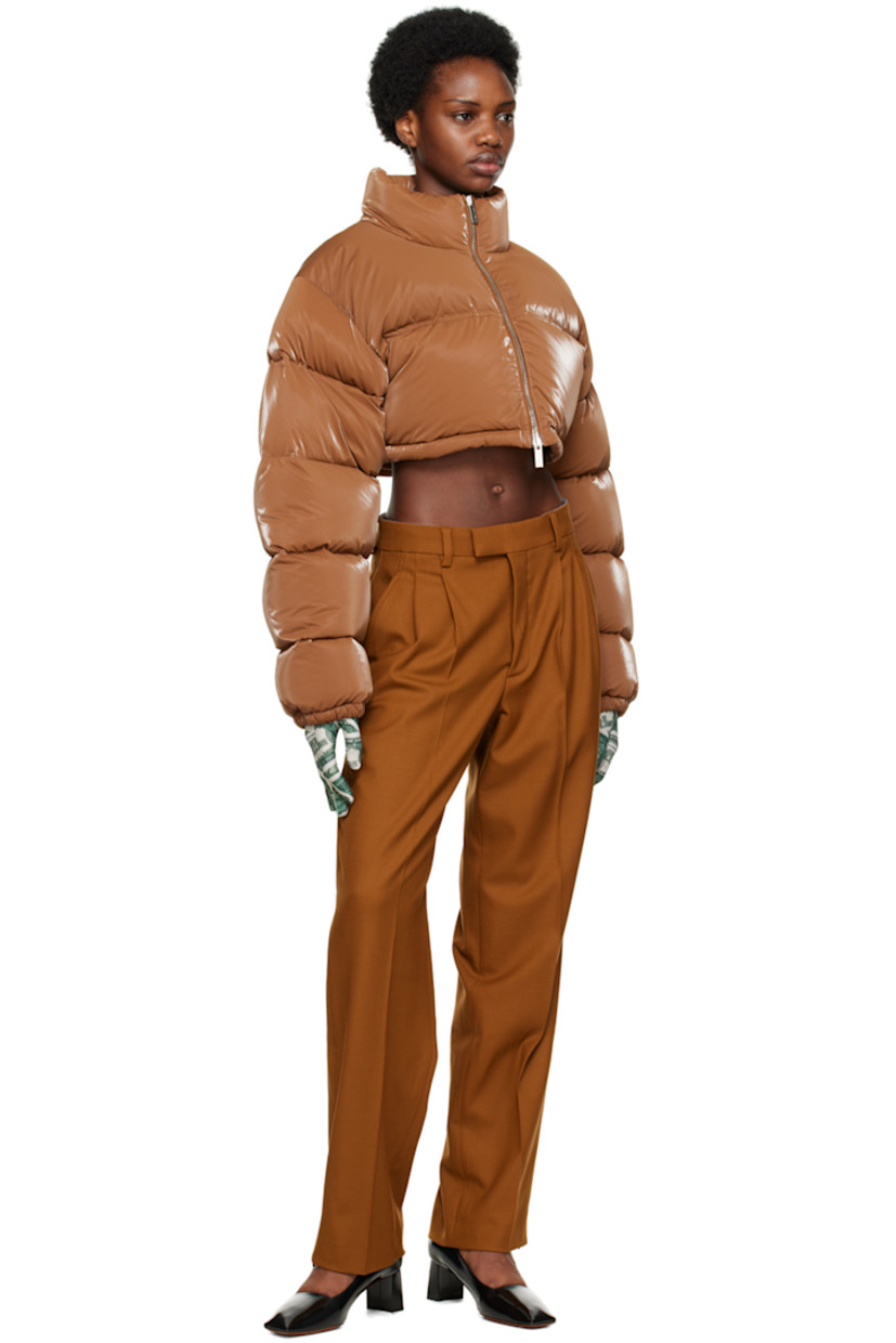 Stretch virgin wool twill trousers. 

· Belt loops
· Hook-eye fastening at waistband 
· Four-pocket styling 
· Zip-fly 
· Pleats at front 
· Zip vent at cuffs 
· Partial viscose sateen lining 

Supplier color: Brown