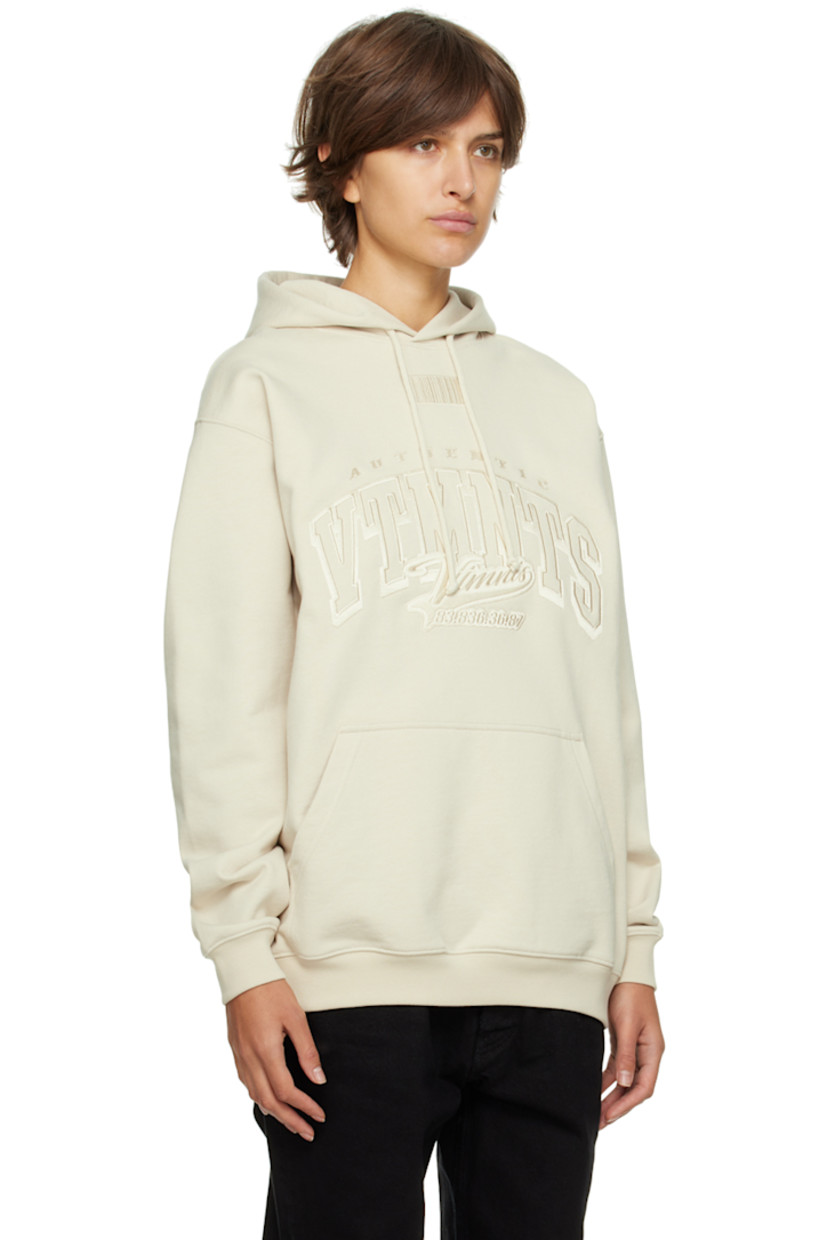 Stretch french terry hoodie. 

· Drawstring at hood 
· Logo and graphic embroidered at front and back 
· Kangaroo pocket 
· Rib knit cuffs and hem 

Supplier color: Off white