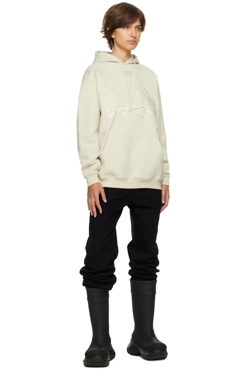 Stretch french terry hoodie. 

· Drawstring at hood 
· Logo and graphic embroidered at front and back 
· Kangaroo pocket 
· Rib knit cuffs and hem 

Supplier color: Off white