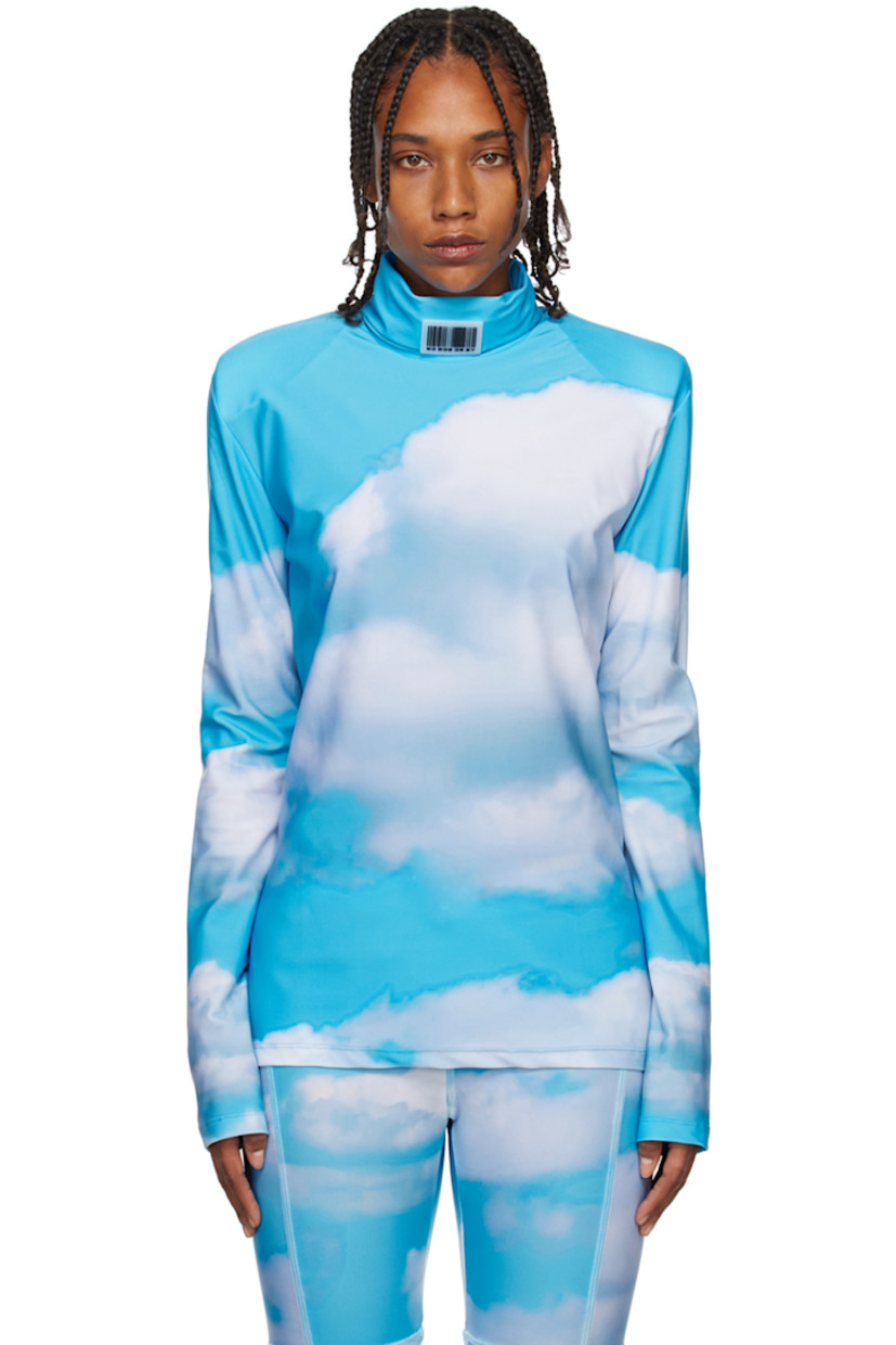 Stretch nylon jersey turtleneck. Graphics printed throughout. 

· Rubberized logo patches at collar
· Padded shoulders 

Supplier color: Sky