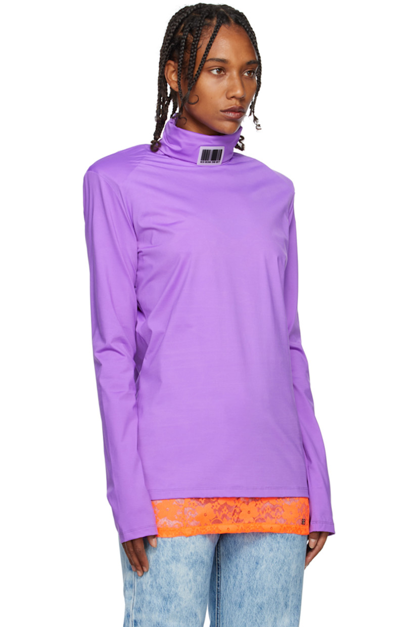 Stretch nylon jersey turtleneck. 

· Rubberized logo patches at collar
· Padded shoulders 

Supplier color: Lilac