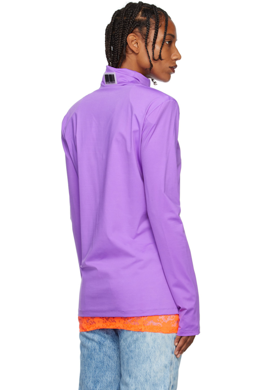 Stretch nylon jersey turtleneck. 

· Rubberized logo patches at collar
· Padded shoulders 

Supplier color: Lilac
