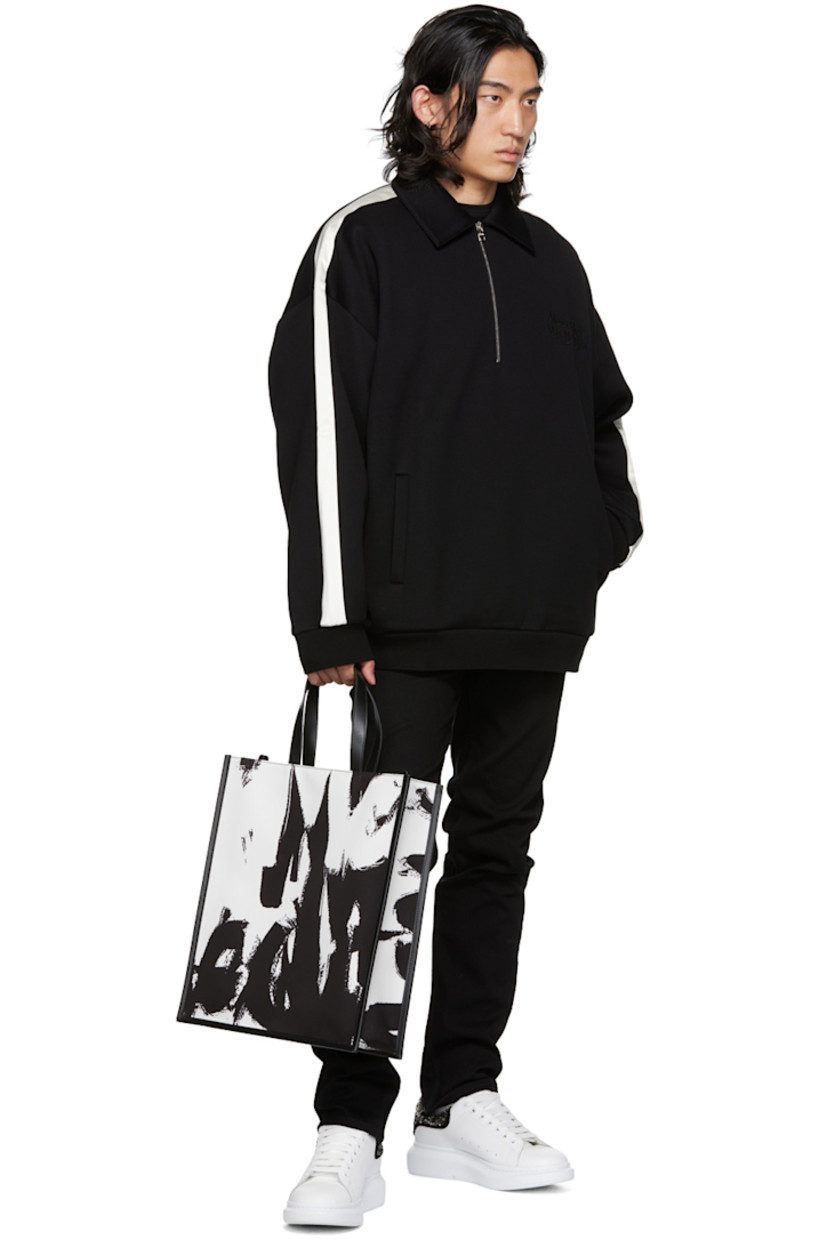 Double-faced jersey sweatshirt.

· Spread collar
· Half-zip closure 
· Logo embroidered at chest 
· Welt pockets 
· Satin trim at sleeves 
· Rib knit cuffs and hem 

Supplier color: Black/Black
